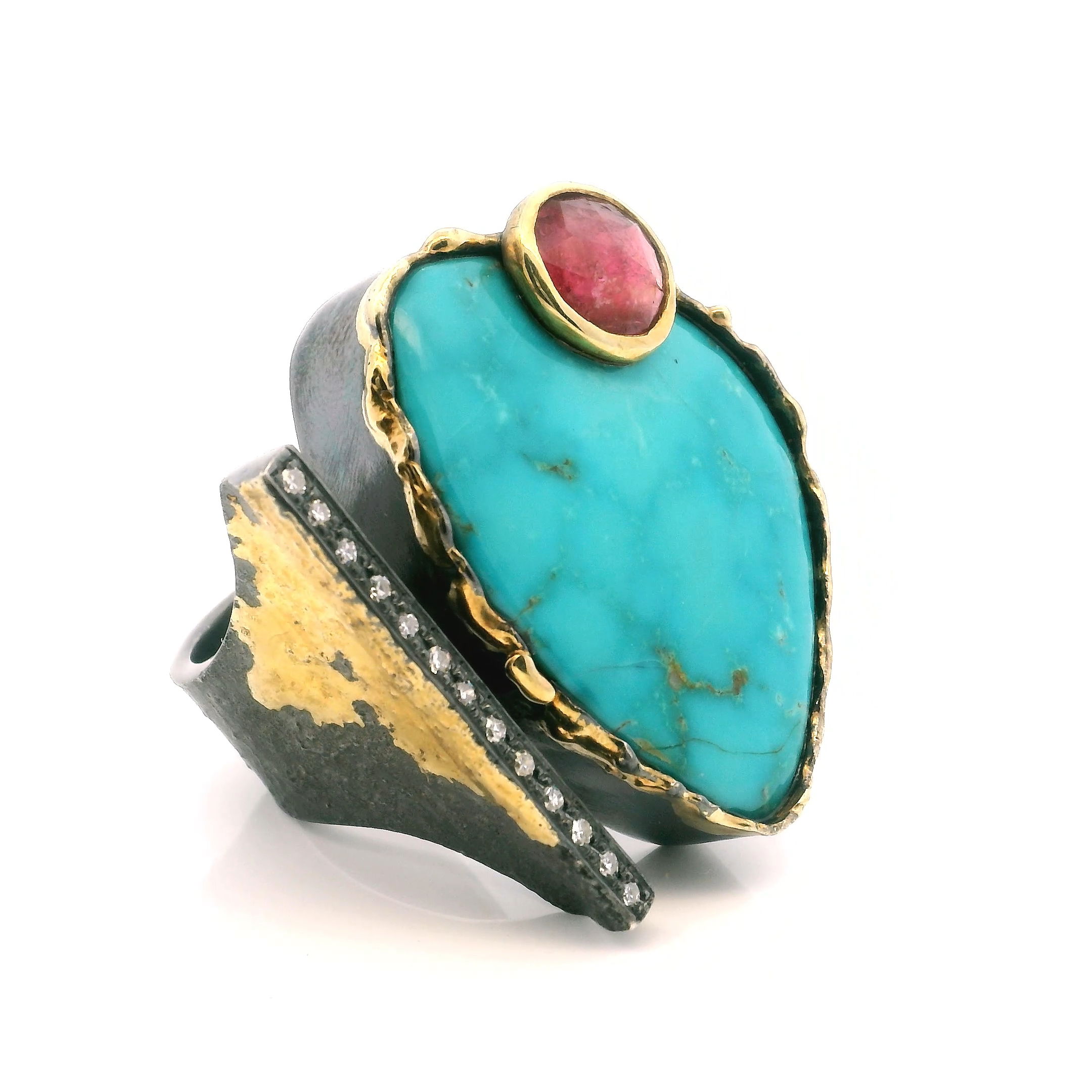 Elevate your style with this captivating Arizona Turquoise Ring crafted in luminous 925 sterling silver. Featuring a vibrant triangular cabochon of Arizona turquoise paired with a sparkling faceted pink tourmaline, this piece commands attention with its bold color contrast.The open band is adorned with a single row of pavé-set diamonds, adding subtle glamour, while artistic dripped gold accents frame the bezel settings with refined artisanal flair. Sized at 8.5, this ring is a statement of modern elegance for those who cherish natural beauty and handcrafted detail. Arizona Turquoise Ring - Triangular Cabochon & Faceted Pink Tourmaline Round on Open Band with Single Row Pave Diamonds & Dripped Gold Accents Bezel Set in 925 Sterling Silver sz8.5