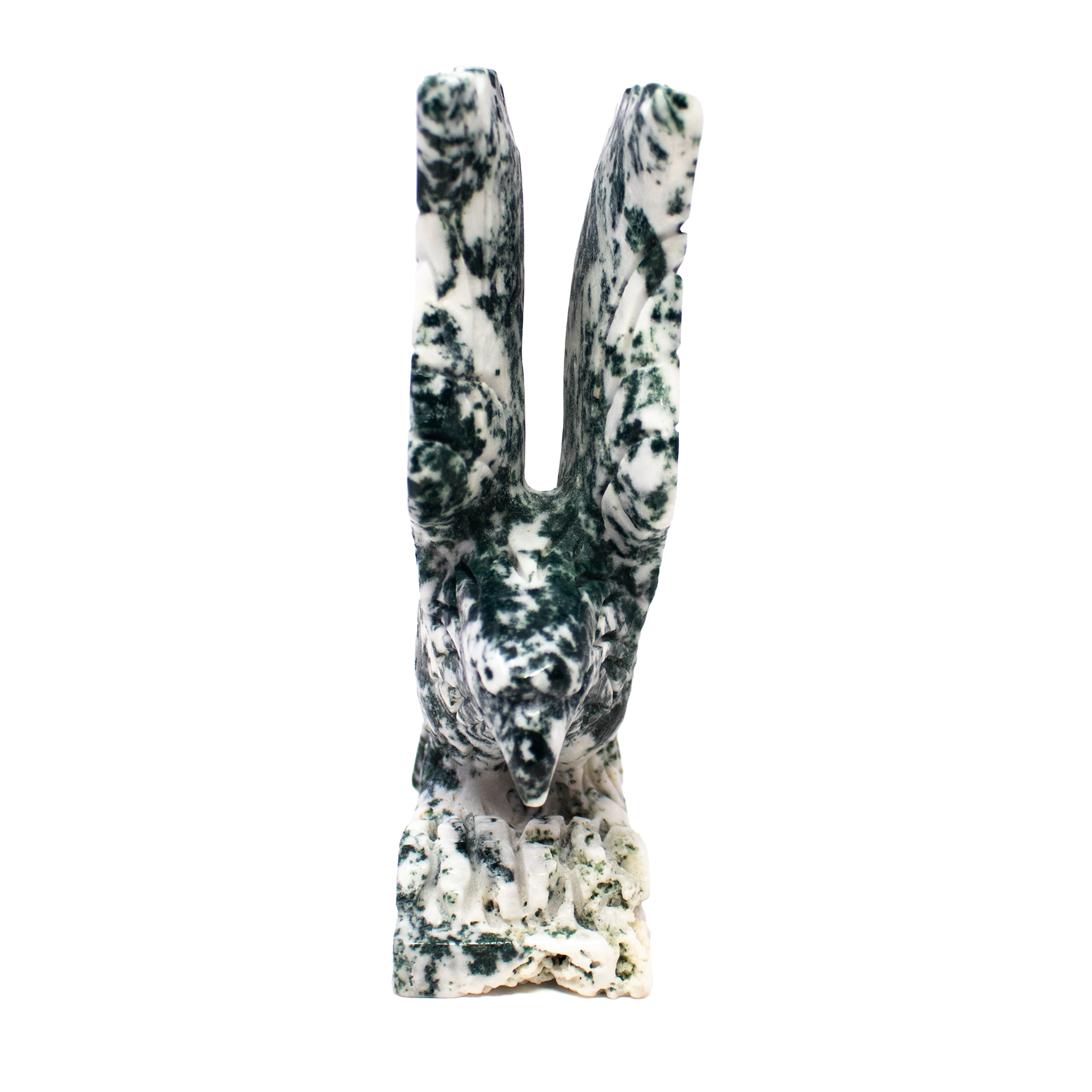 Bring the spirit of nature into your space with our Moss Agate Eagle Carving, a striking fusion of gemstone artistry and symbolic power. Carved from genuine moss agate, each piece features naturally occurring green inclusions that mimic forested landscapes—imbuing the eagle with an organic, lifelike presence. The sculpted wings, fierce eyes, and poised stance evoke freedom, vision, and strength, while the grounding energy of moss agate adds a sense of calm and connection to the earth.Whether displayed on a shelf, desk, or altar, this one-of-a-kind carving makes an inspiring gift for nature lovers, spiritual seekers, or collectors of fine minerals. Let this majestic eagle uplift your space with its quiet elegance and timeless symbolism. Moss Agate Eagle Carving