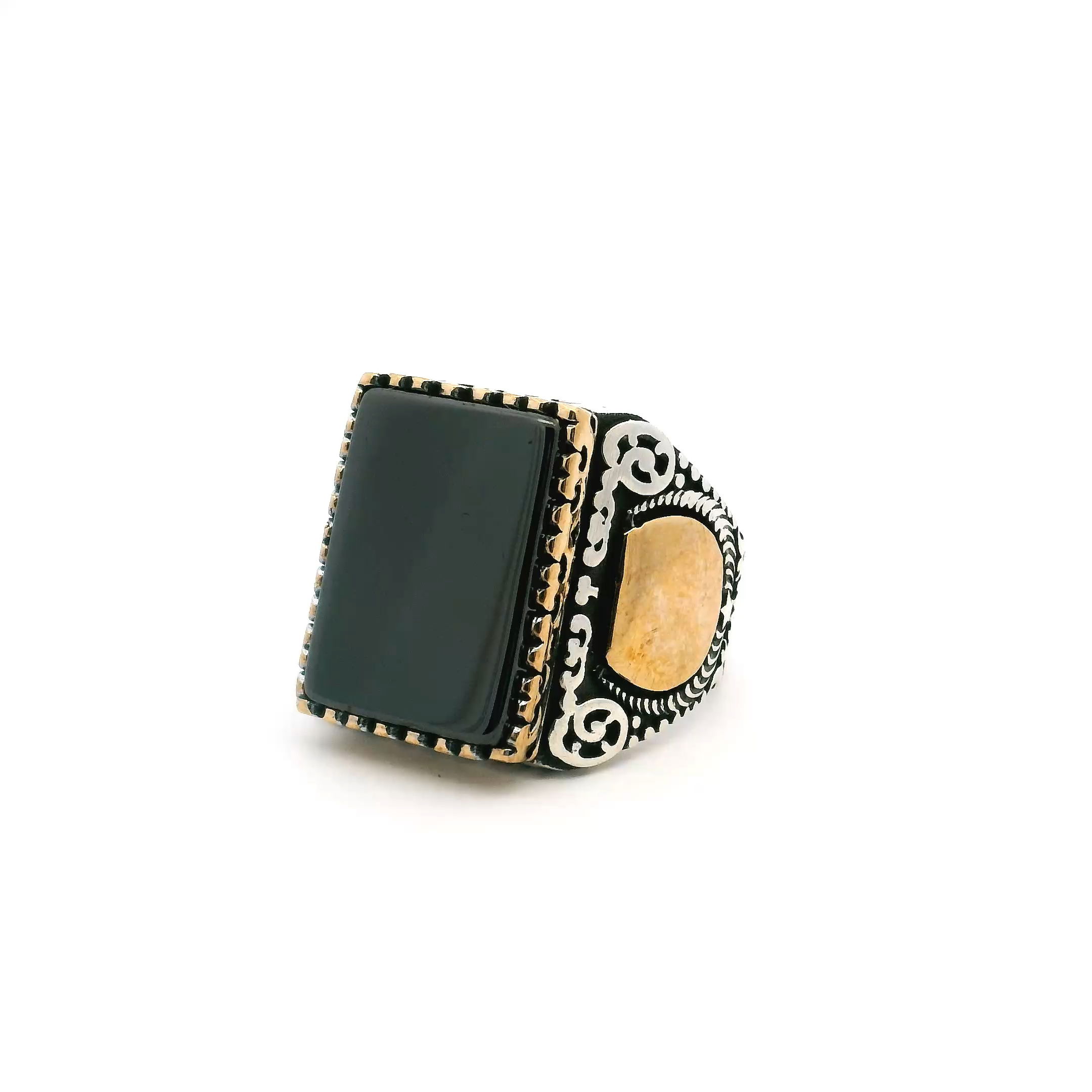 Command attention with this striking Hematite Ring, crafted for the modern man who values strength, style, and symbolism. A bold rectangular hematite gemstone anchors the design, set flush within a distinctive sawtooth bezel that adds sharp edge and designer appeal. Polished gold vermeil crescent moon accents bring a touch of mystique and contrast, evoking a sense of power and quiet clarity. Made from solid 925 sterling silver and sized at 10 for a secure, comfortable fit, this ring is a fusion of durability and celestial elegance. A powerful statement piece for those drawn to refined craftsmanship and meaningful design. Hematite Ring - Rectangle Flat in Designer Sawtooth Setting with Gold Vermeil Moon Details in 925 Sterling Silver sz10