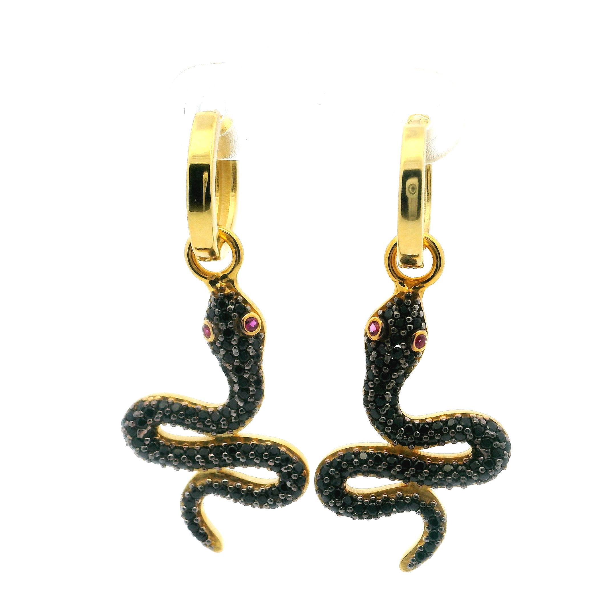 Unveil your unique allure with these Swarovski Crystal Dangle Earrings, elegantly shaped into sleek black snakes that shimmer with every move. Set with radiant Swarovski crystals and piercing pink nano stone eyes, each serpentine form is richly finished in gold vermeil over 925 sterling silver for lasting luxury. Designed to enchant and empower, these earrings strike the perfect balance between bold edge and refined sparkle—ideal for those who embrace statement style with a touch of mystery. A captivating addition to any jewelry collection. Swarovski Crystal Dangle Earrings - Black Snake with Pink Eyes in Gold Vermeil over 925 Sterling Silver