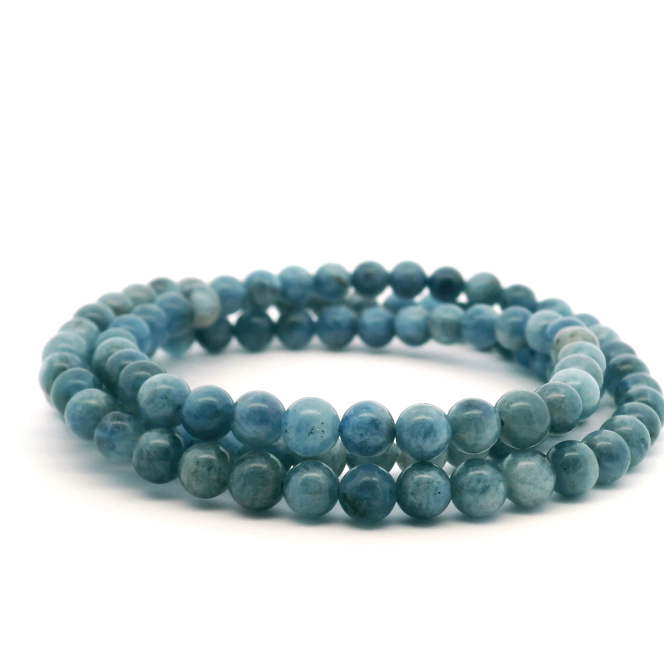 Elevate your style with the Aquamarine Beaded Necklace, featuring smooth 5mm natural aquamarine beads in serene shades of blue, each strung on a strong, flexible elastic cord. Designed to be worn as a graceful necklace or wrapped multiple times as a bracelet, this handcrafted piece brings both beauty and versatility. Known for its calming energy and connection to clarity, aquamarine adds a peaceful elegance to any look—perfect for everyday wear or special occasions alike. Aquamarine Beaded Necklace - 5mm on Elastic (Multiwrap Bracelet)