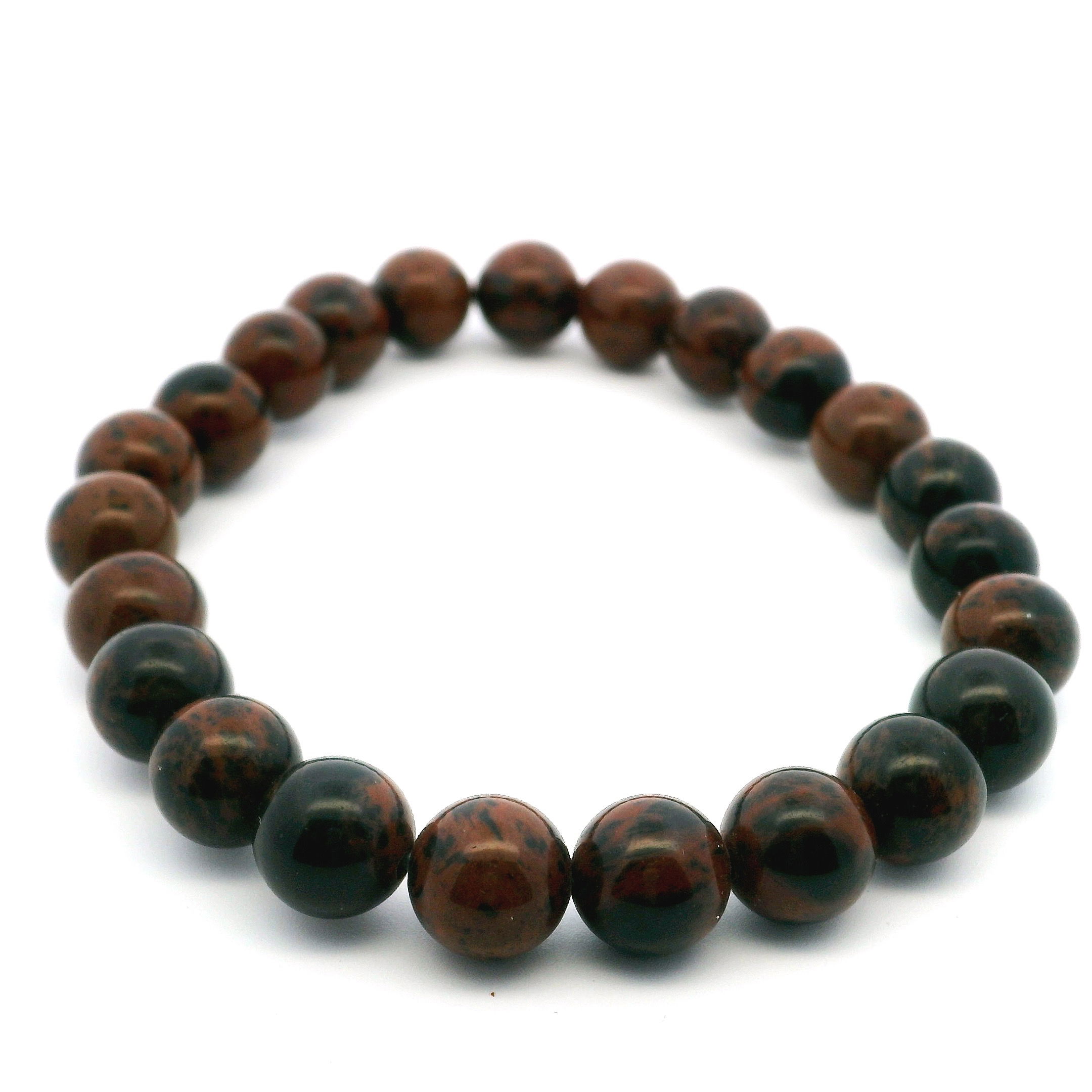 Elevate your style and ground your energy with the Mahogany Obsidian Beaded Bracelet, featuring polished 8mm round beads in warm, earthy tones of deep red and black. Revered for its protective and stabilizing properties, mahogany obsidian is a stone of strength and balance. Hand-strung on a durable elastic cord for a flexible, comfortable fit, this bracelet is perfect for everyday wear or layering with your favorite pieces. A bold yet timeless accessory, it brings natural elegance and meaning to any jewelry collection. Mahogany Obsidian Beaded Bracelet - 8mm Round