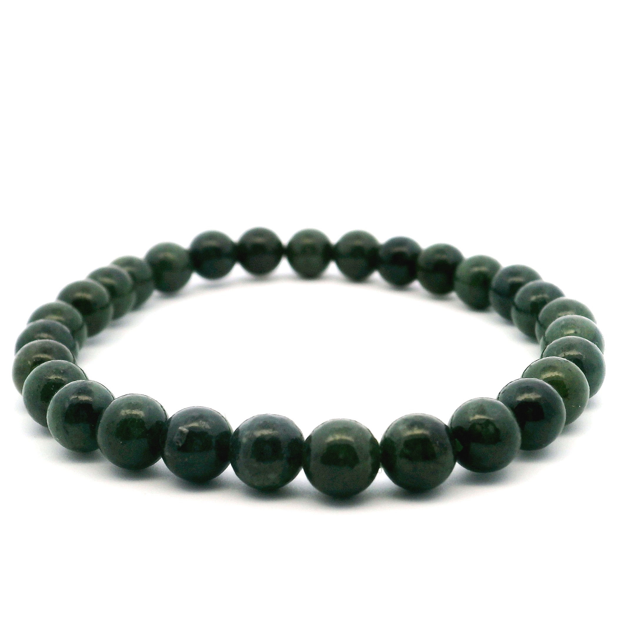 Embrace the serene beauty and timeless elegance of our Canadian Nephrite Jade Beaded Bracelet, featuring 6mm–7mm round beads in rich, earthy green tones. Sourced from Canada’s renowned jade deposits, each polished stone reveals subtle variations and natural depth, celebrated for symbolizing harmony, protection, and good fortune. Hand-strung on a durable stretch cord, this bracelet offers lasting comfort and refined versatility—ideal for daily wear or layering with other favorites. A graceful blend of tradition and style, it makes a thoughtful gift or a personal piece of grounding elegance. Canadaian Nephrite Jade Beaded Bracelet - 6mm-7mm Rounds