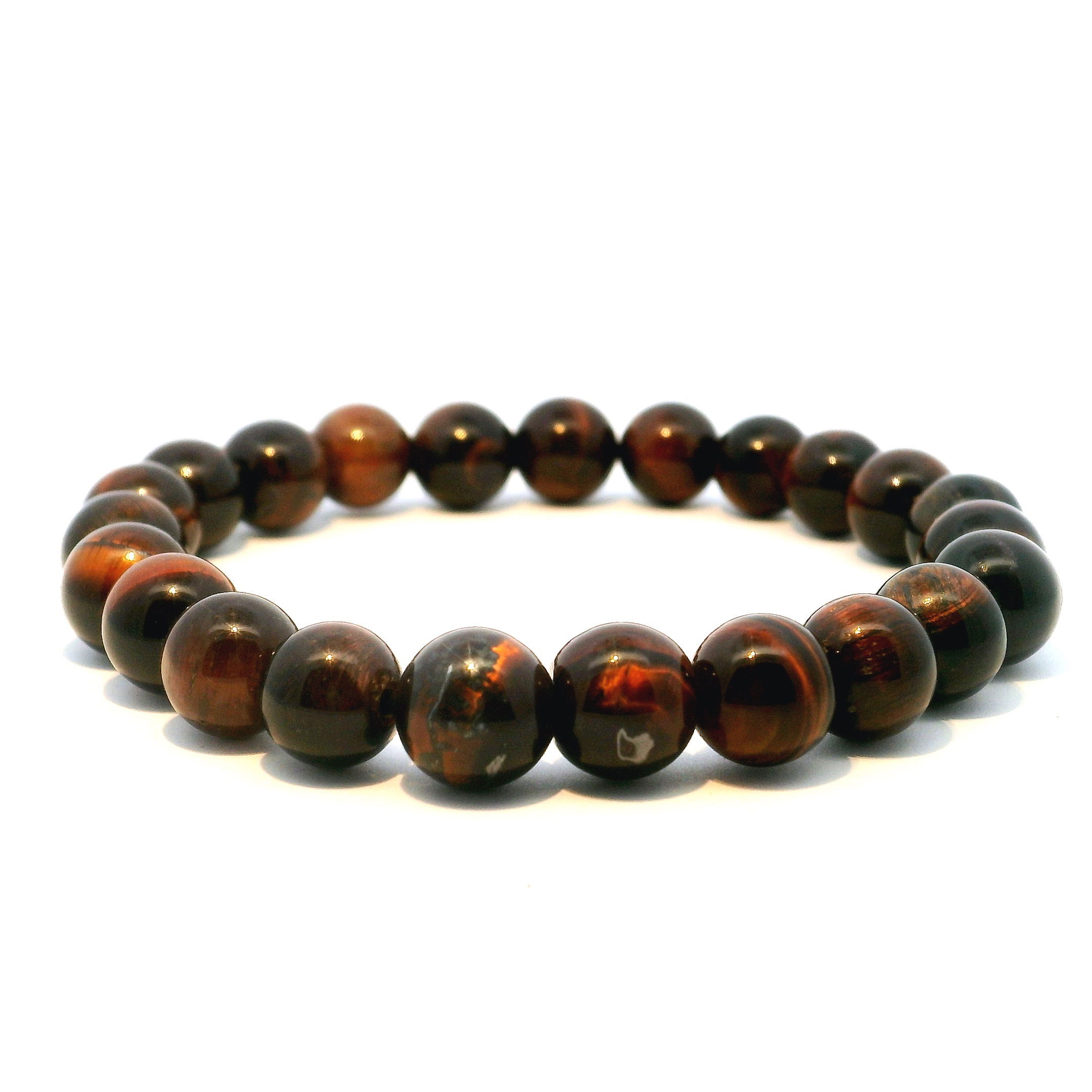 Radiate strength and confidence with our Red Tiger’s Eye Beaded Bracelet, featuring bold 8mm round beads that shimmer with rich, reddish-brown chatoyancy. Known for its grounding and energizing properties, Red Tiger’s Eye is said to ignite motivation, focus, and inner power. Expertly hand-strung on a durable stretch cord for lasting comfort, this bracelet is perfect for daily wear, meditation, or layering with your favorite pieces. A striking balance of style and intention, it’s an empowering addition to any jewelry collection. Red Tigers Eye Beaded Bracelet - 8mm Rounds