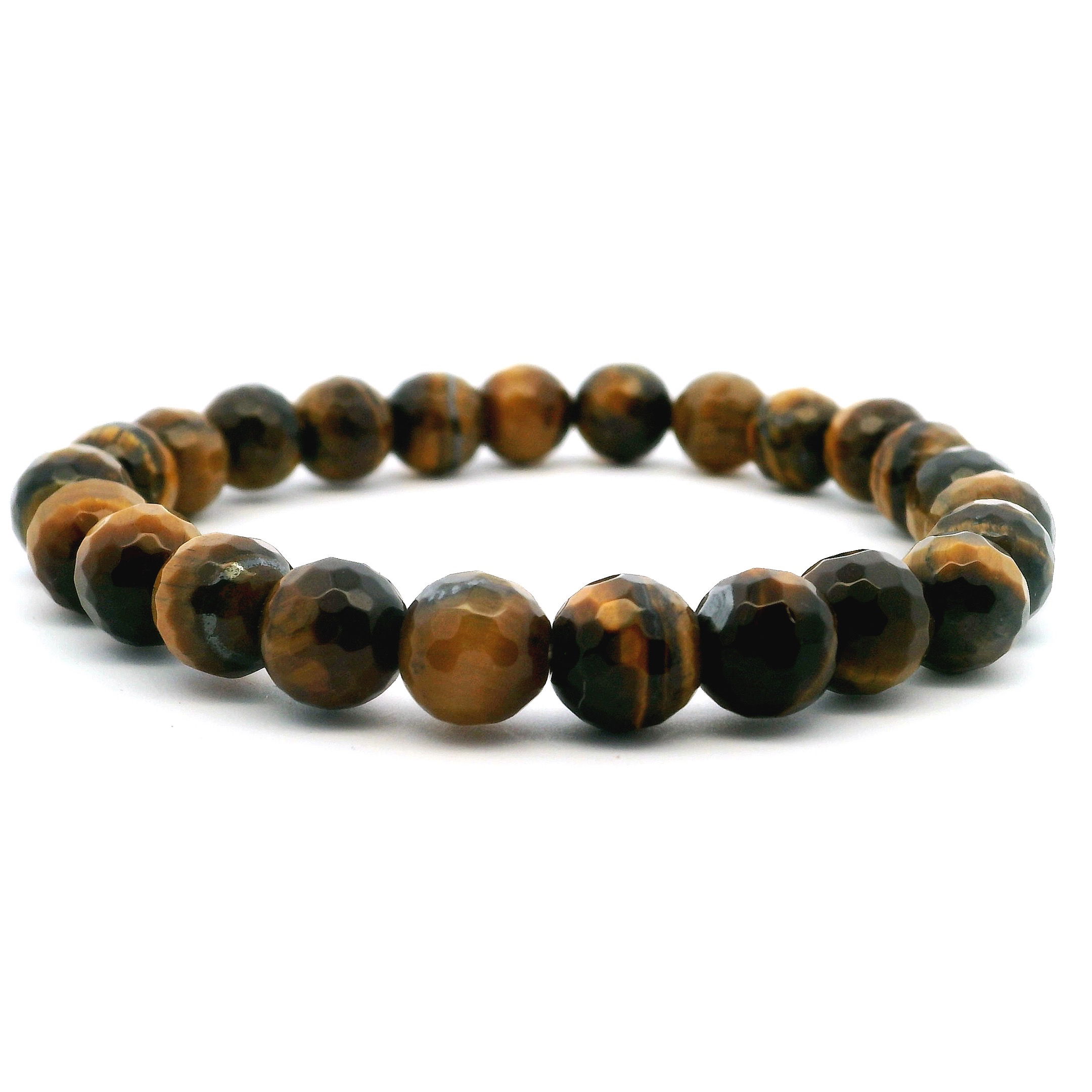 Radiating confidence and clarity, this Yellow Tiger’s Eye Beaded Bracelet is crafted with faceted 8mm round stones that catch the light with every turn. Each golden-brown bead reveals the natural chatoyancy and depth of Tiger’s Eye, a stone long valued for its grounding energy and protective power. Strung on a sturdy stretch cord for a secure, comfortable fit, this bracelet blends effortless style with intentional design. Whether worn alone or layered, it’s a bold yet versatile piece—perfect for anyone drawn to strength, motivation, and timeless natural beauty. Yellow Tigers Eye Beaded Bracelet - Faceted 8mm Round