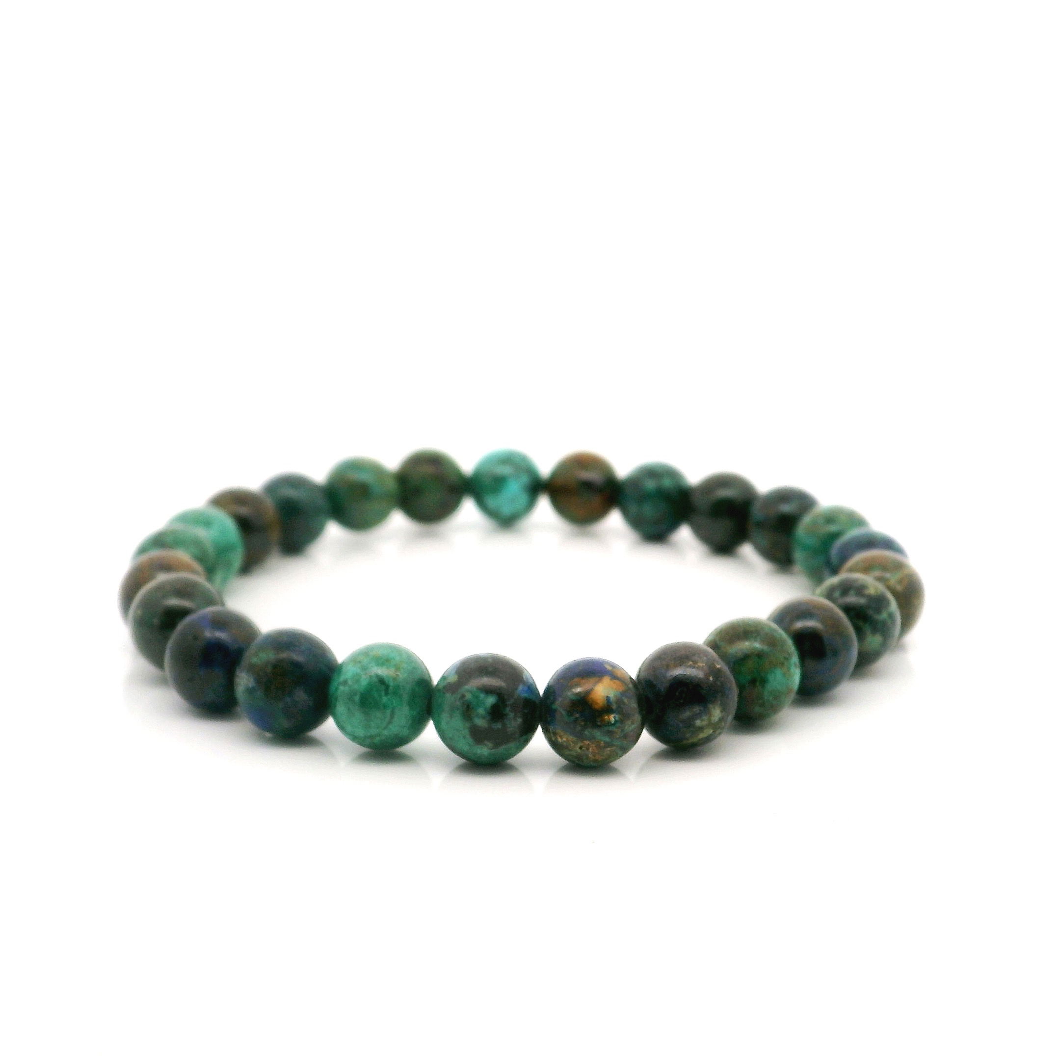 Elevate your style and spirit with our Chrysocolla Beaded Bracelet, featuring smooth 7mm round gemstones. Renowned for its calming blue-green hues and tranquil energy, each Chrysocolla bead is carefully selected and polished to highlight its unique patterns. Strung on a durable elastic cord for a comfortable, easy fit, this versatile bracelet adds a touch of natural beauty to any outfit. Chrysocolla Beaded Bracelet - 7mm Rounds
