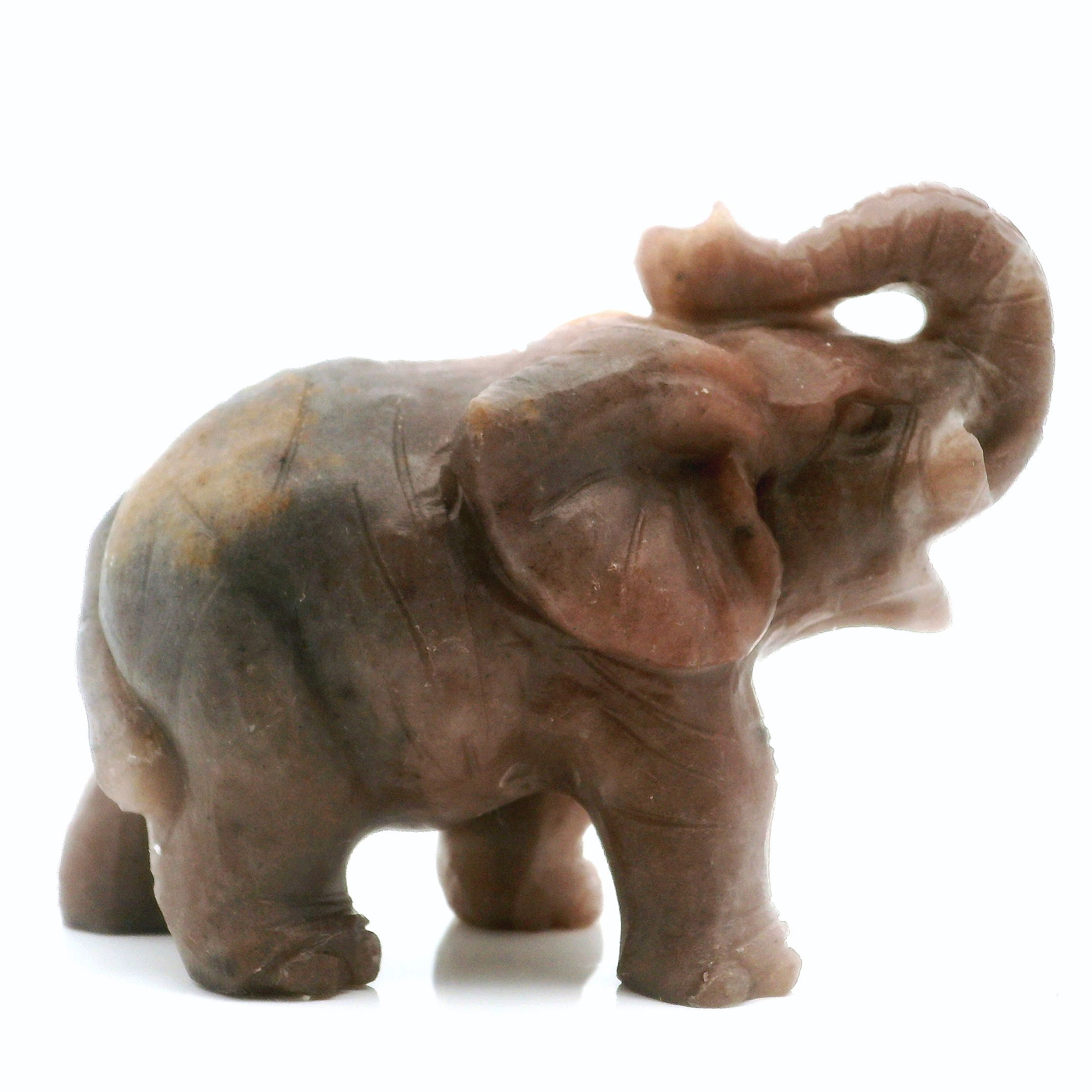 Elevate your décor with this exquisite Jasper Elephant Carving, featuring striking white tusks that highlight its majestic presence. Handcrafted from premium jasper, each sculpture showcases unique, natural patterns and rich earthy tones, making it a standout piece for any home or office. Symbolizing wisdom, protection, and good fortune, this elegant elephant is an ideal gift for loved ones or a meaningful addition to your own collection. Its intricate detailing and polished finish reflect exceptional craftsmanship, ensuring lasting beauty and a timeless charm in any setting. Jasper Elephant Carving with White Tusks