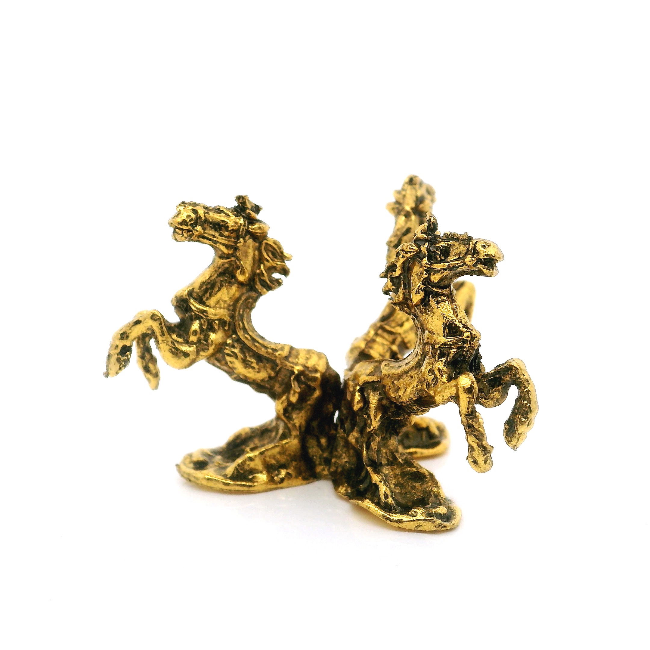 Elevate your crystal spheres or decorative orbs with this Casted Base Metal 3 Horses Sphere Stand in a luxurious gold finish. Expertly crafted, this unique stand features three intricately detailed horses, their forms gracefully supporting your favorite spheres. The sturdy metal construction ensures durability, while the radiant gold color adds a touch of elegance to any space. Perfect for collectors and home decorators, this stand blends classic artistry with modern sophistication—making it an eye-catching centerpiece for desks, shelves, or display cabinets. Casted Base Metal 3 Horses Sphere Stand - Gold
