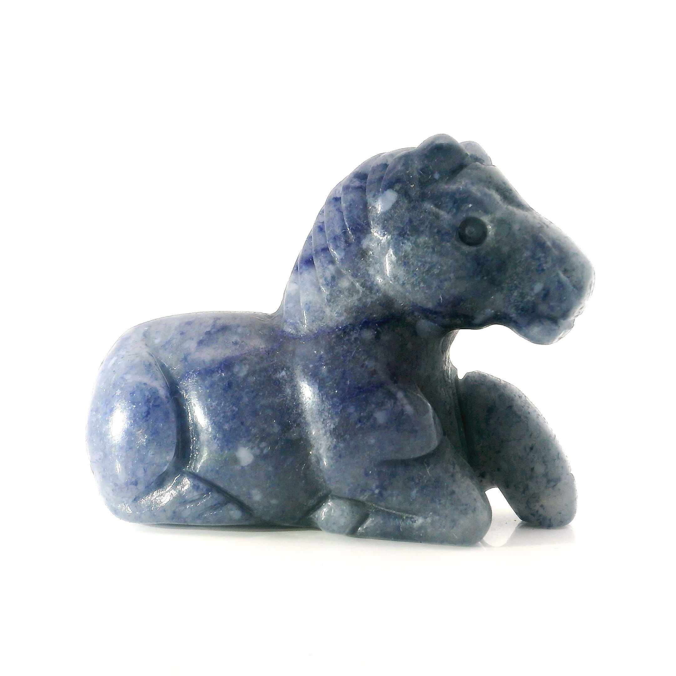 Elevate your space with the tranquil charm of this Blue Aventurine Horse Carving in a graceful laying down posture. Expertly sculpted from genuine blue aventurine, each piece captures the serene spirit and strength of the horse in exquisite detail. The cool blue hues of the crystal infuse your home or office with calming energy, believed to encourage clarity, confidence, and inner peace. Perfect as a unique gift, thoughtful décor accent, or addition to your crystal collection, this beautifully carved sculpture embodies both elegance and healing artistry. Ideal for animal lovers, collectors, or anyone seeking a touch of harmony and sophistication in their environment. Blue Aventurine Horse Carving - Laying Down Posture
