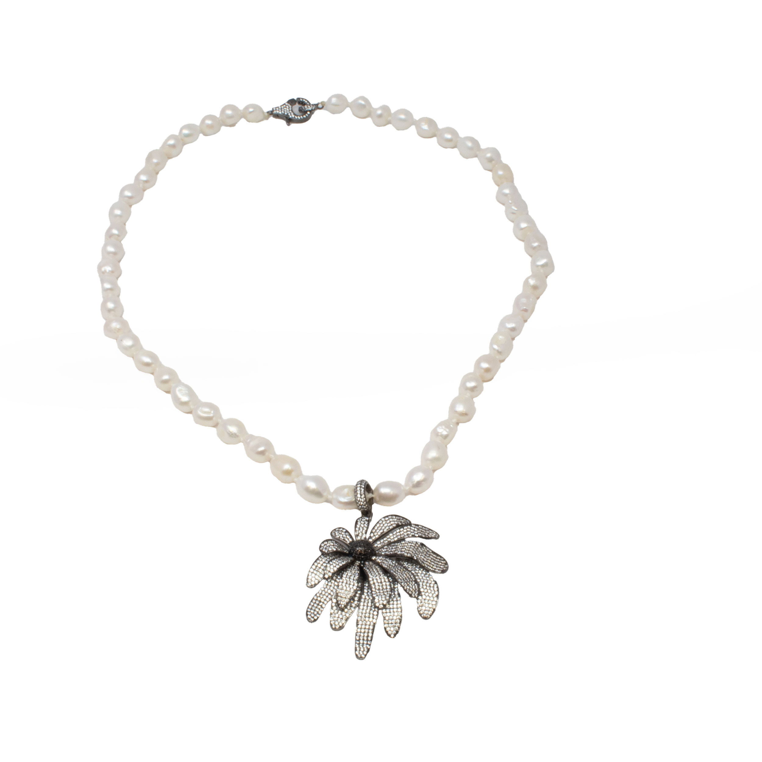 Elevate your style with our Baroque Pearl Necklace, a stunning blend of elegance and modern artistry. Each necklace features naturally lustrous Baroque pearls—cherished for their unique shapes and iridescent sheen—strung along a dark-finished 925 sterling silver chain for a sophisticated, contemporary touch. Adorned with removable Swarovski crystals in clear and black, this versatile piece lets you customize your look, taking you seamlessly from day to night. Baroque Pearl Necklace - Baroque Pearls with Removable Clear & Black Swarovski Crystals in Dark Finish over 925 Sterling Silver
