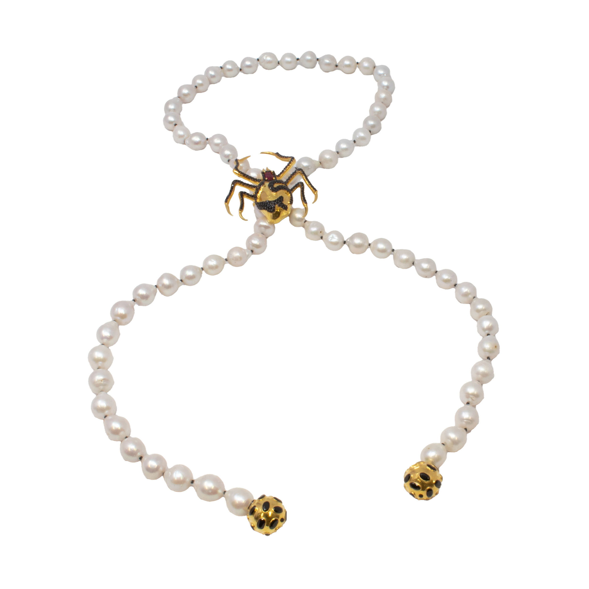Dare to make a statement with this Baroque Pearl Lariat-Style Necklace—a luxurious conversation piece blending timeless elegance with modern intrigue. Irregularly-shaped baroque pearls shimmer alongside gleaming gold vermeil spheres, punctuated by dark faceted stones for a dramatic contrast. The highlight: a removable gold vermeil spider, dazzling with black nano stones, offering playful versatility and distinctive allure. Crafted on a base of 925 sterling silver for lasting beauty, this dynamic necklace can be worn with or without the spider, elevating any look from simple sophistication to avant-garde glamour. Baroque Pearl Necklace - Lariat-Style Baroque Pearl Necklace with Gold Vermeil Spheres with Dark Faceted Stones & Removable Gold Vermeil Spider with Black Nano Stones in 925 Sterling Silver