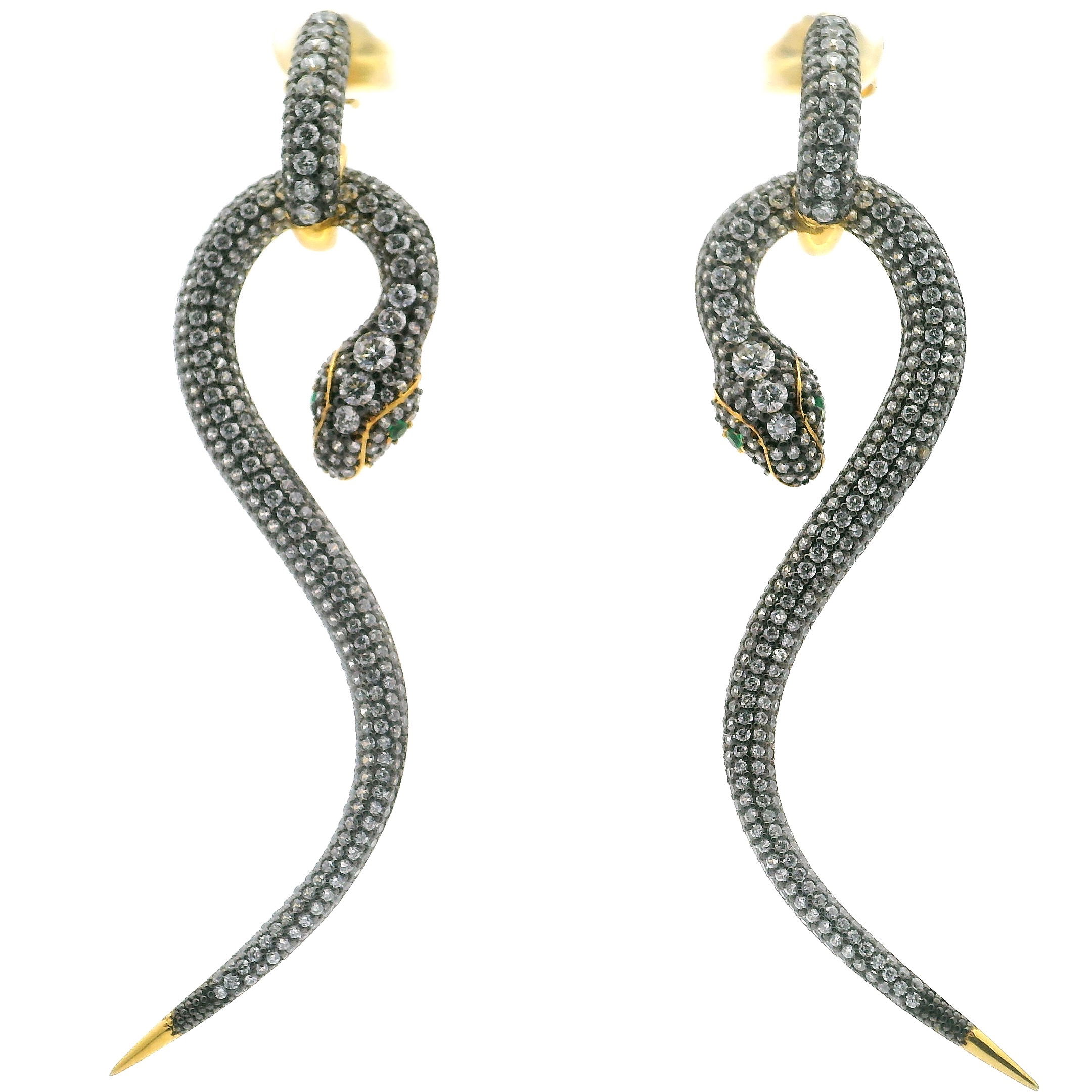 Turn heads with the Nano Stone Dangle Earrings, a mesmerizing fusion of elegance and intrigue. Each two-piece earring showcases a sinuous snake motif, beautifully crafted in gold vermeil over 925 sterling silver for a lustrous, lasting shine. The serpent’s body is adorned with glistening quartz crystals, accentuating its fluid movement, while bright green eyes add a hint of mystical allure. Lightweight and exquisitely detailed, these long dangle earrings are perfect for adding a statement finish to your ensemble—whether for evening glamour or everyday enchantment. Nano Stone Dangle Earrings - Long Pink Snake with Green Eyes in Gold Vermeil over 925 Sterling Silver
