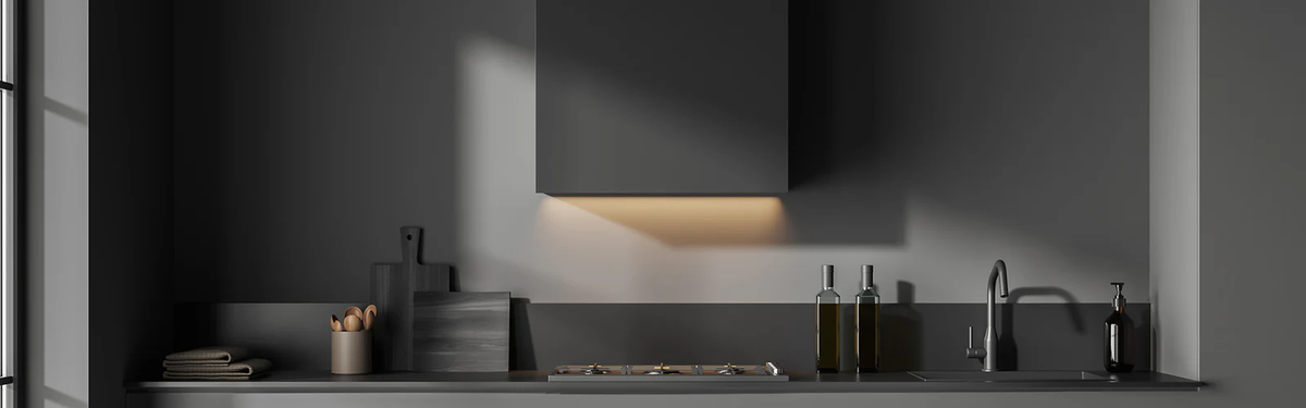 Curated fine jewelry arranged on a soft neutral surface