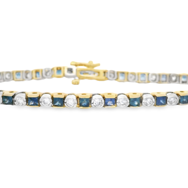 14K YELLOW GOLD BEZEL SET TENNIS BRACELET WITH 26 PRINCESS CUT SAPPHIRES 3.38CT & 26 ROUND DIAMONDS 1.82CT TOTAL WEIGHT