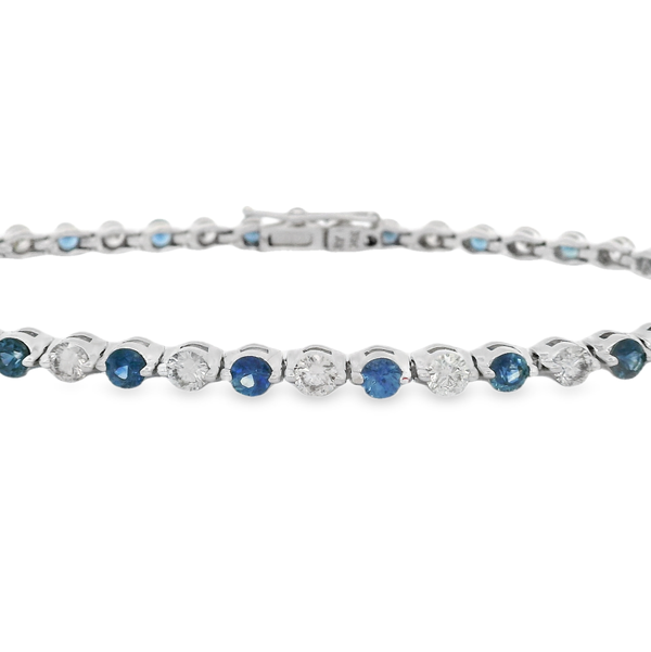 14K WHITE GOLD TENNIS BRACELET WITH 22 ROUND SAPPHIRES @ 2.20CT & 21 ROUND DIAMONDS @ 2.00CT