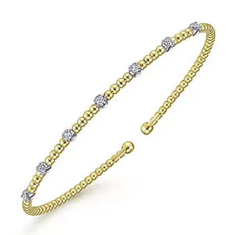 14K YG/WG 7 DIA'S 0.20CT DIAMOND STATION BANGLE BRACELET- 6.25"