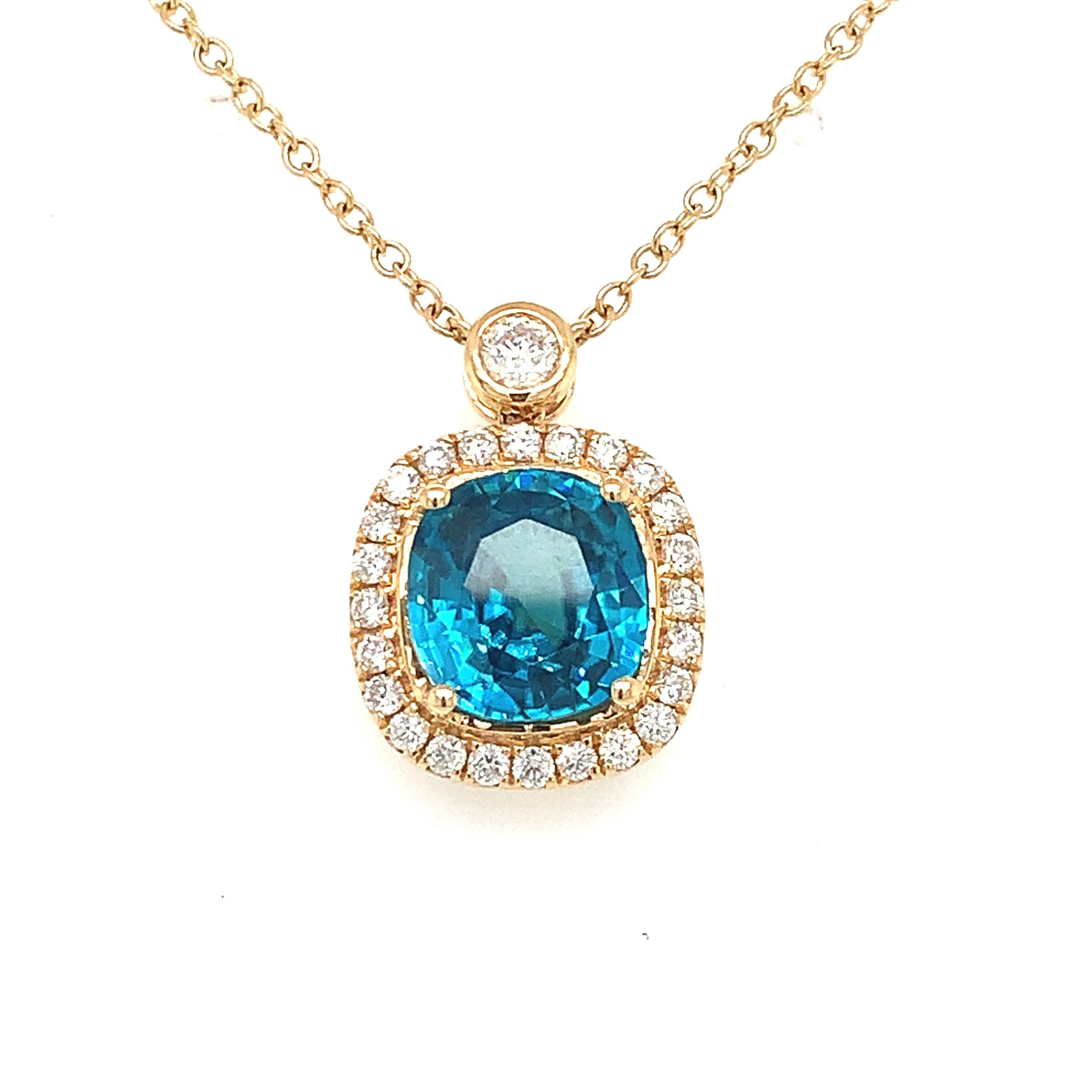 18KYG 7.10CT CUSHION BLUE ZIRCON & 25 BR DIA'S 0.57CT FASHION HALO PENDANT W/18" CHAIN