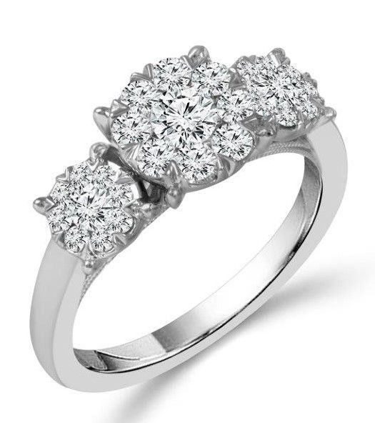 Celebrate your forever with this exquisite 14K white gold "3-Stone" cluster engagement ring. Dazzling with 29 brilliant round diamonds totaling 0.50 carats, this ring features a stunning trio of clusters that symbolize your past, present, and future together. The timeless design and radiant sparkle make it a perfect choice for marking life's most meaningful commitment. Skillfully crafted for elegance and comfort, this engagement ring is sure to captivate her heart every day. 14KWG 29 BR DIAMONDS 0.50CT "3-STONE" CLUSTER RING