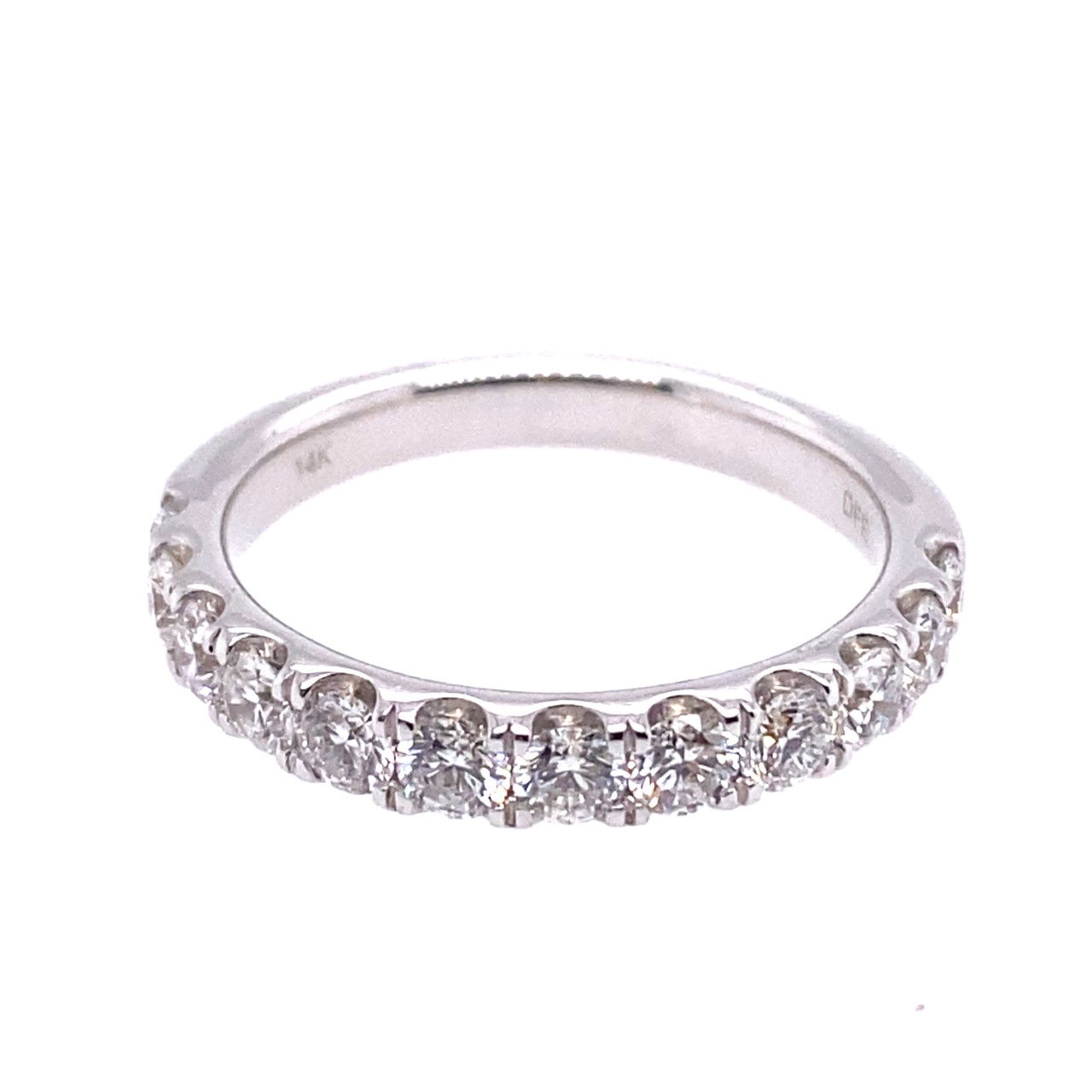 Celebrate your everlasting love with this stunning 14K white gold wedding band, exquisitely crafted for the sophisticated bride. Featuring 10 brilliant round diamonds totaling an impressive 1.25 carats, each stone is meticulously set in a classic straight prong design to maximize sparkle and light. This women’s diamond wedding band offers a timeless elegance—perfect to wear alone or paired seamlessly with your engagement ring. Make every moment shine with enduring luxury and radiant beauty. 14K WG 10 BR DIA'S 1.25CT STRAIGHT PRONG BAND