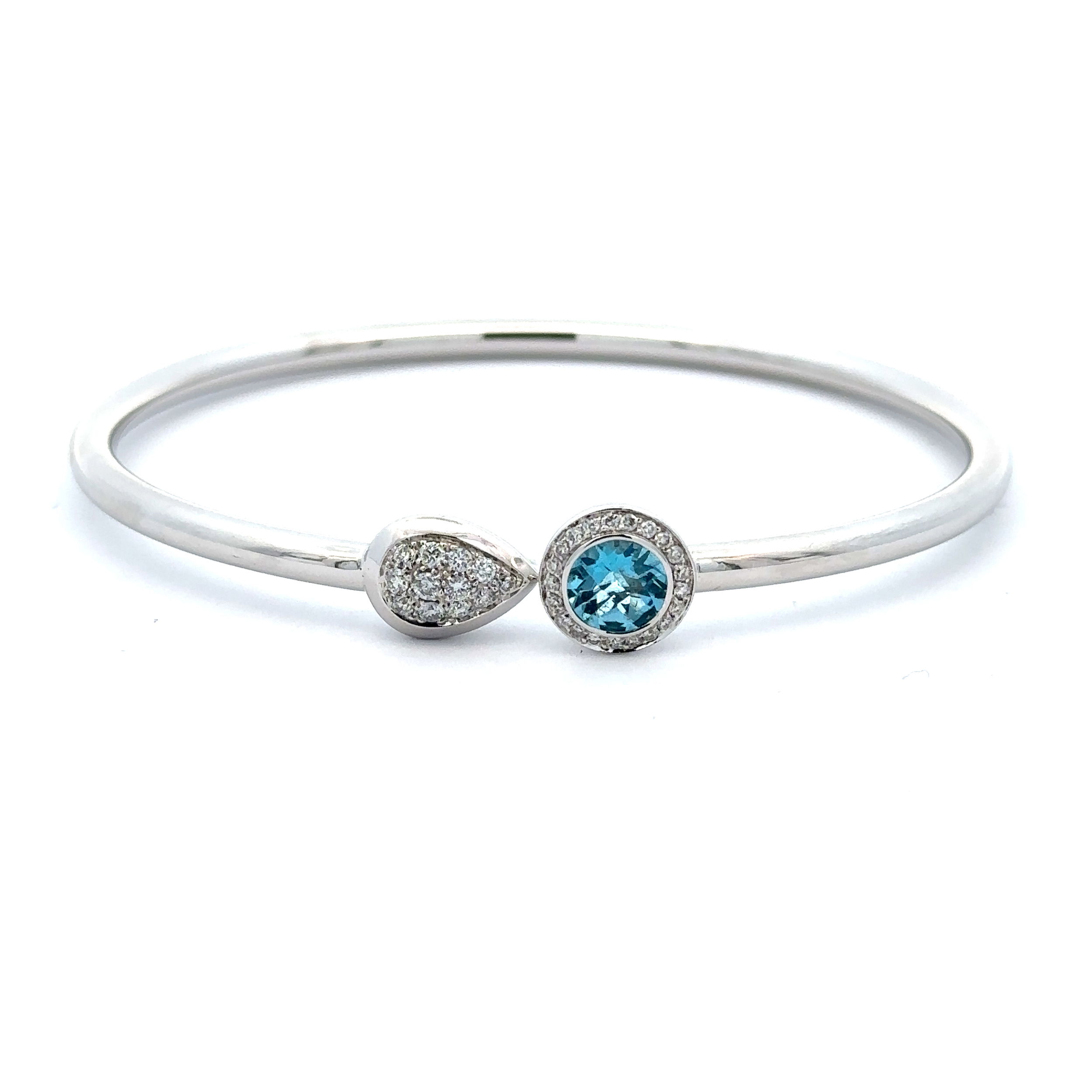 18KWG 1.02CT ROUND BLUE TOPAZ & 33 BR DIAMONDS 0.29CT FLEXI-BANGLE 18KWG 1.02CT ROUND BLUE TOPAZ & 33 BR DIAMONDS 0.29CT FLEXI-BANGLE