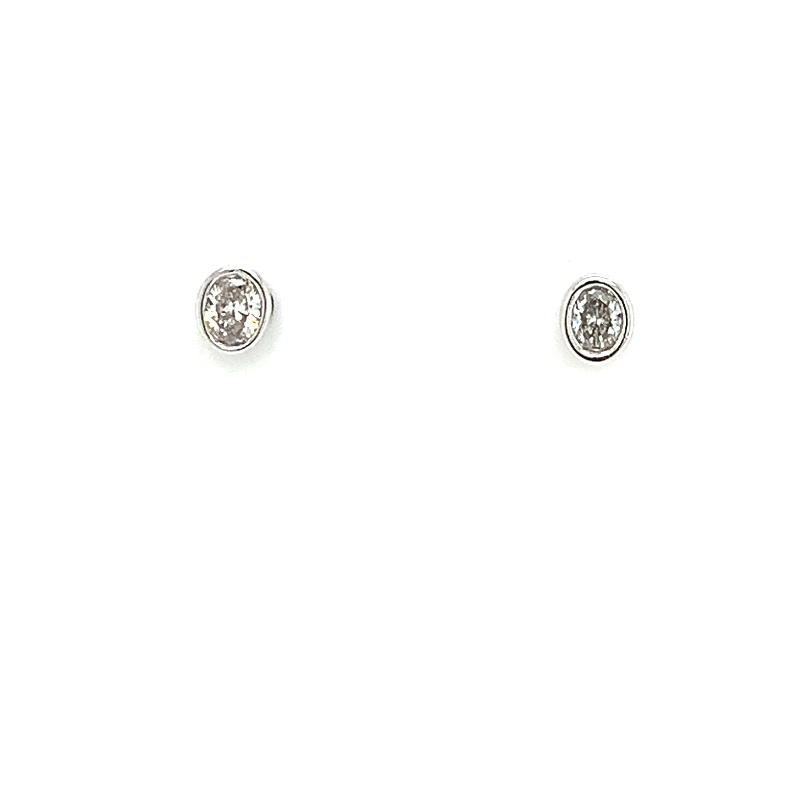 14K WG 0.19CT OVL DIA'S BEZEL SET STUD EARRINGS