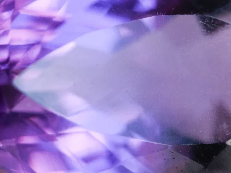 Purple gemstones including amethyst and tanzanite