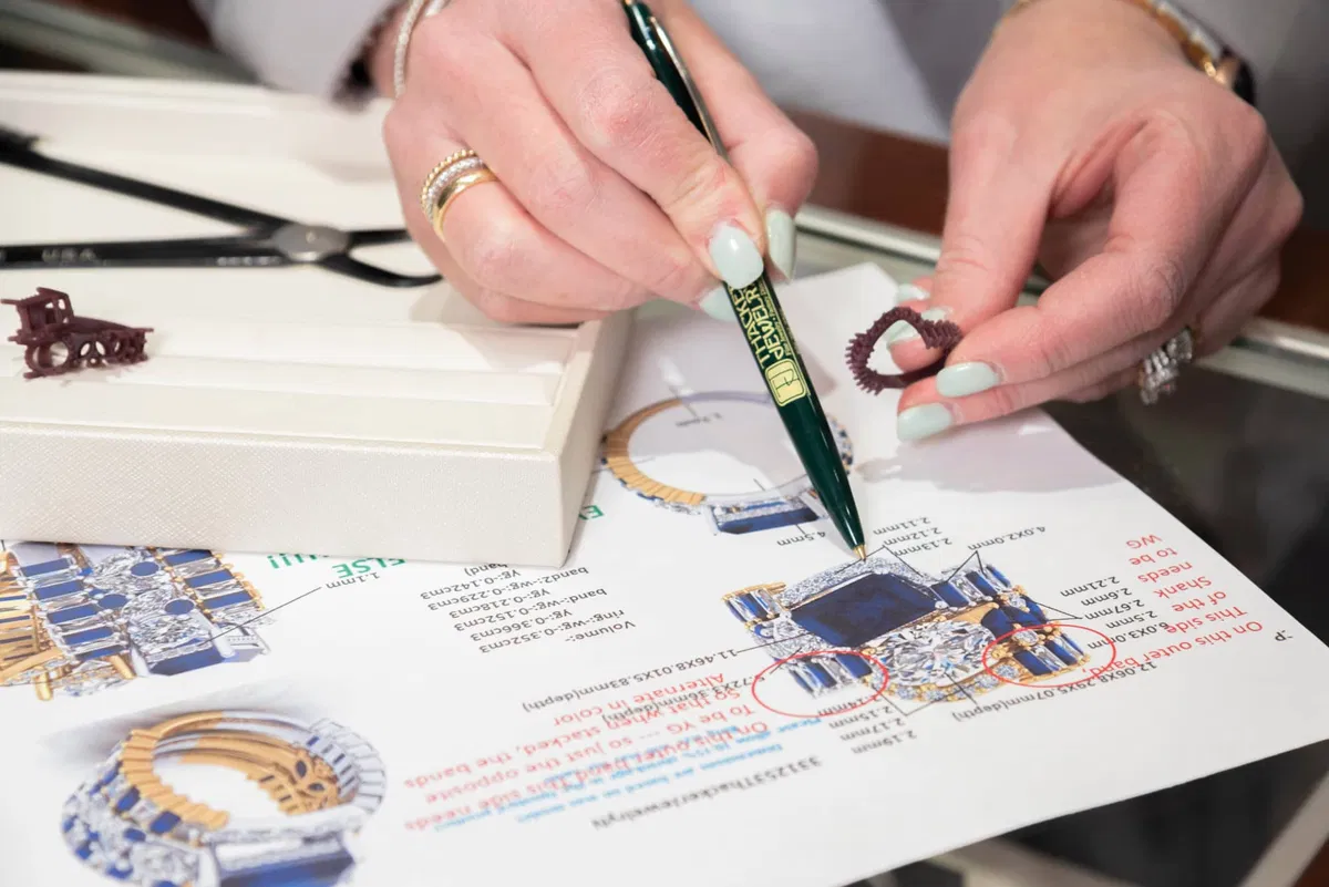Jeweler handcrafting custom engagement ring setting