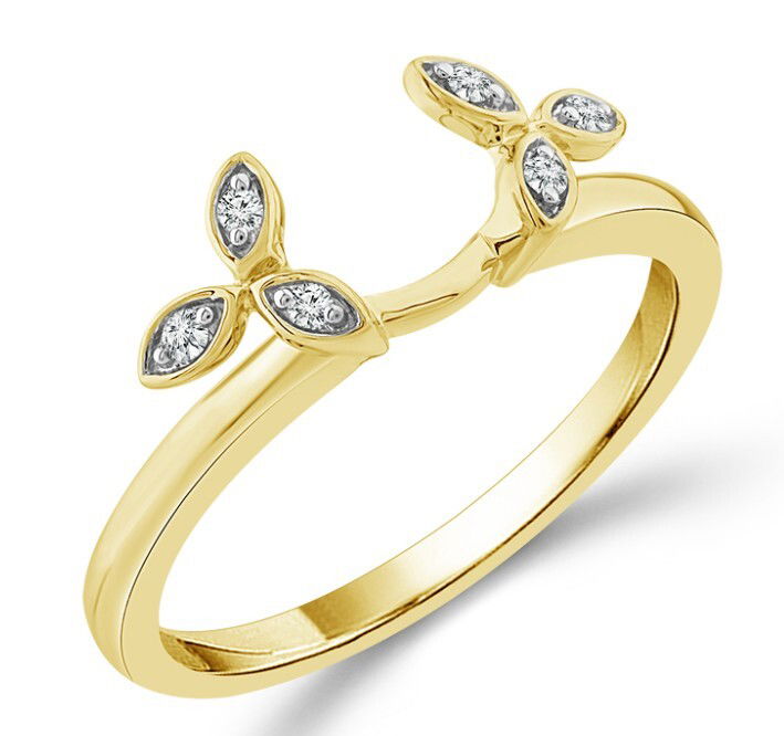 Celebrate nature’s elegance with our 10K Yellow Gold 6 Round Diamond Floral/Leaf-Inspired Ring Wrap. This exquisite ring guard features six sparkling diamonds, totaling 0.05 carats, delicately set in a graceful arrangement reminiscent of vines and leaves. Designed as a wedding band or a dazzling enhancer for your existing ring, its openwork design wraps beautifully around your solitaire or stack, adding a unique touch of radiance. Crafted for women who appreciate refined, romantic style, this diamond ring wrap offers both versatility and sophistication, making it the perfect addition to your fine jewelry collection. 10KYG 6 BR DIAMONDS 0.05CT FLORAL/LEAF INSPIRED RING WRAP