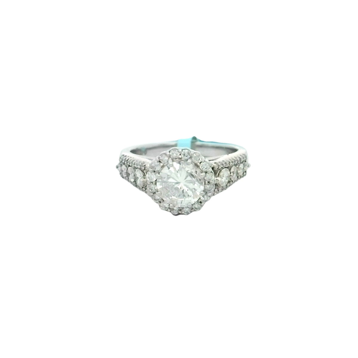 Celebrate forever with this breathtaking 14K white gold engagement ring, crowned by a dazzling 1.09ct round brilliant HPHT diamond at its center (G color, I1 clarity). Encircling the centerpiece, sixty-four shimmering round accent diamonds (0.61ctw) form a luminous halo and multi-row design that radiates elegance from every angle. Thoughtfully crafted to maximize brilliance and sparkle, this exquisite ring is the perfect symbol of your enduring love and commitment. 14K WG 1.09CT G/I1 BR DIA(HPHT) & 64 BR DIA'S 0.61CTW ROUND HALO MULTI-ROW ENG RING
