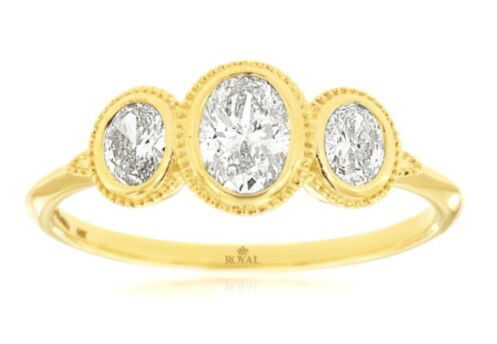 Celebrate your love with this exquisite 14K yellow gold three-stone ring, featuring three shimmering oval diamonds totaling 0.75 carats. Each diamond is expertly bezel set, offering a modern yet timeless look that enhances brilliance and security. The trio of sparkling diamonds symbolizes your past, present, and future together, making it a meaningful engagement ring or a memorable anniversary gift. Crafted with precision, the elegant design delivers both sophistication and comfort, ensuring it will be cherished for generations to come. 14KYG 3 OVAL DIAMONDS 0.75CT BEZEL SET 3-STONE RING