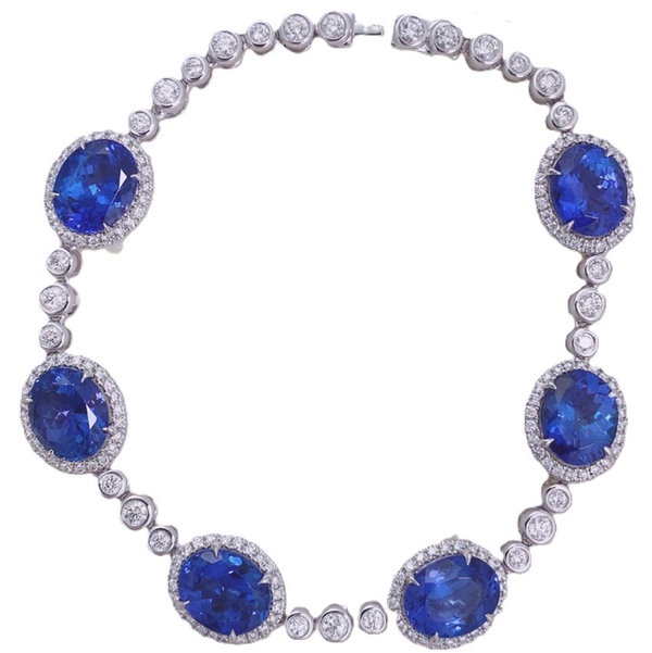 18KW 6 OVAL TANZANITE 16.85CT & 172 ROUND DIAMONDS 2.26CT 7" HALO TENNIS BRACELET