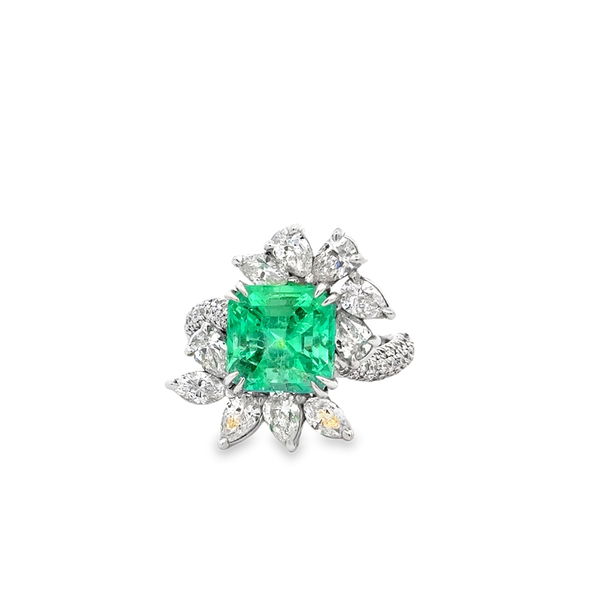 Closeup photo of 14KWG 3.52CT ASSCHER CUT EMERALD -- 3 MARQUISE DIAMONDS 0.41CT -- 7 PEAR SHAPE DIAMONDS 1.22CT -- 60 ROUND DIAMONDS 0.54CT HALO RING