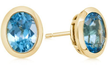 10KY 6X4 OVAL BLUE TOPAZ BEZEL SET STUD EARRINGS