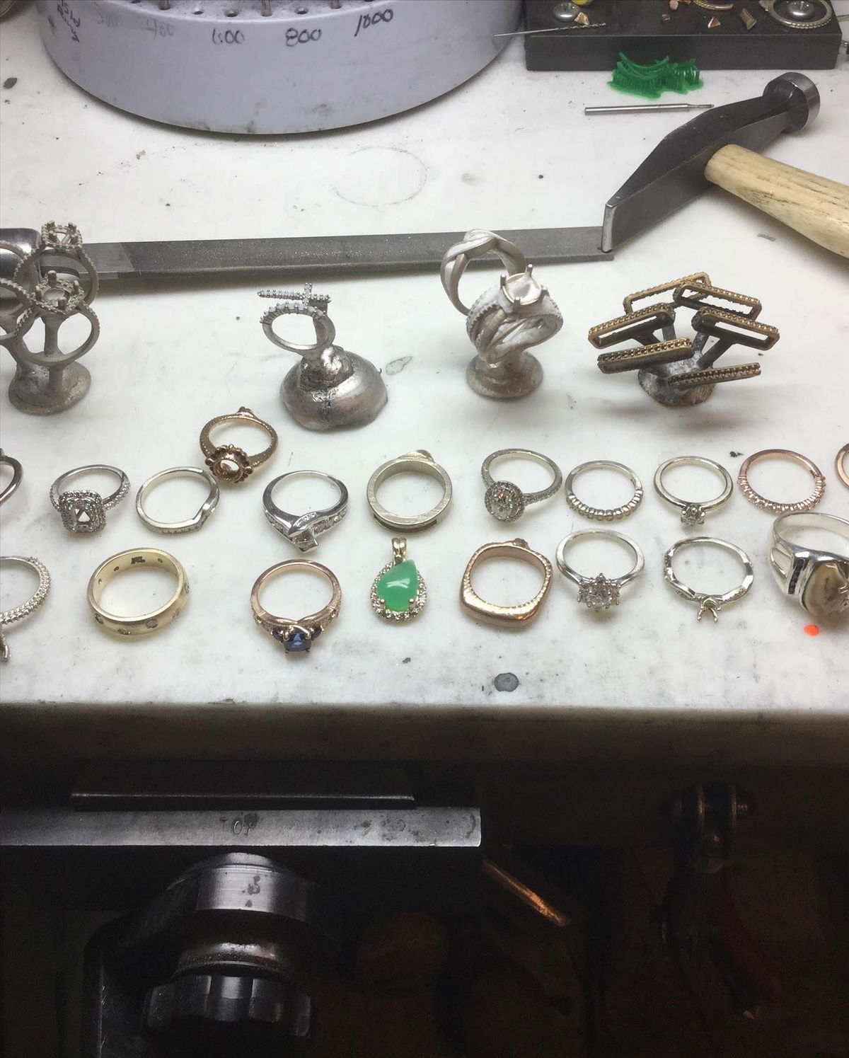 Rings laid out on the bench at The Jewelers Shop