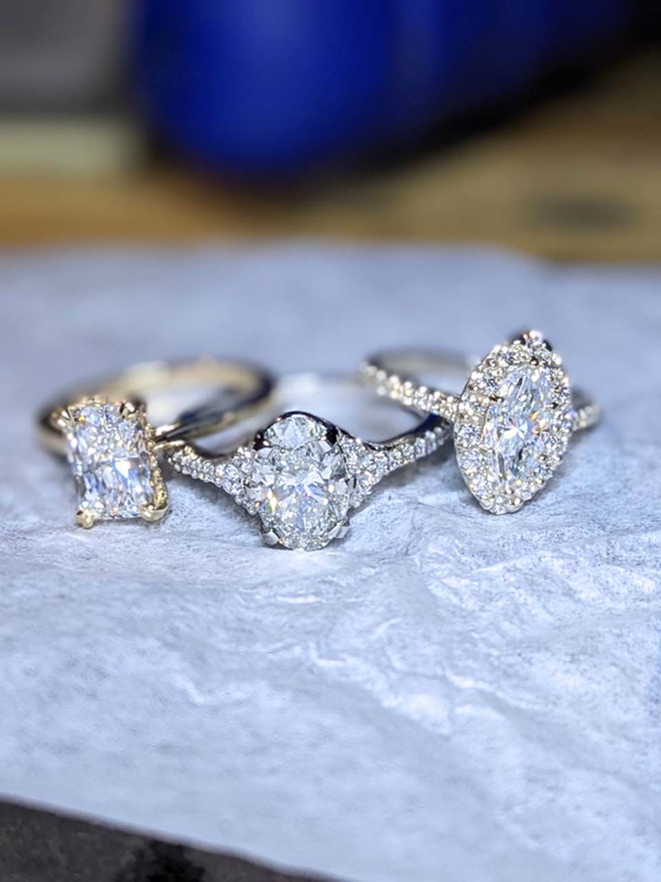 Three rings are sitting on top of each other on a piece of paper.