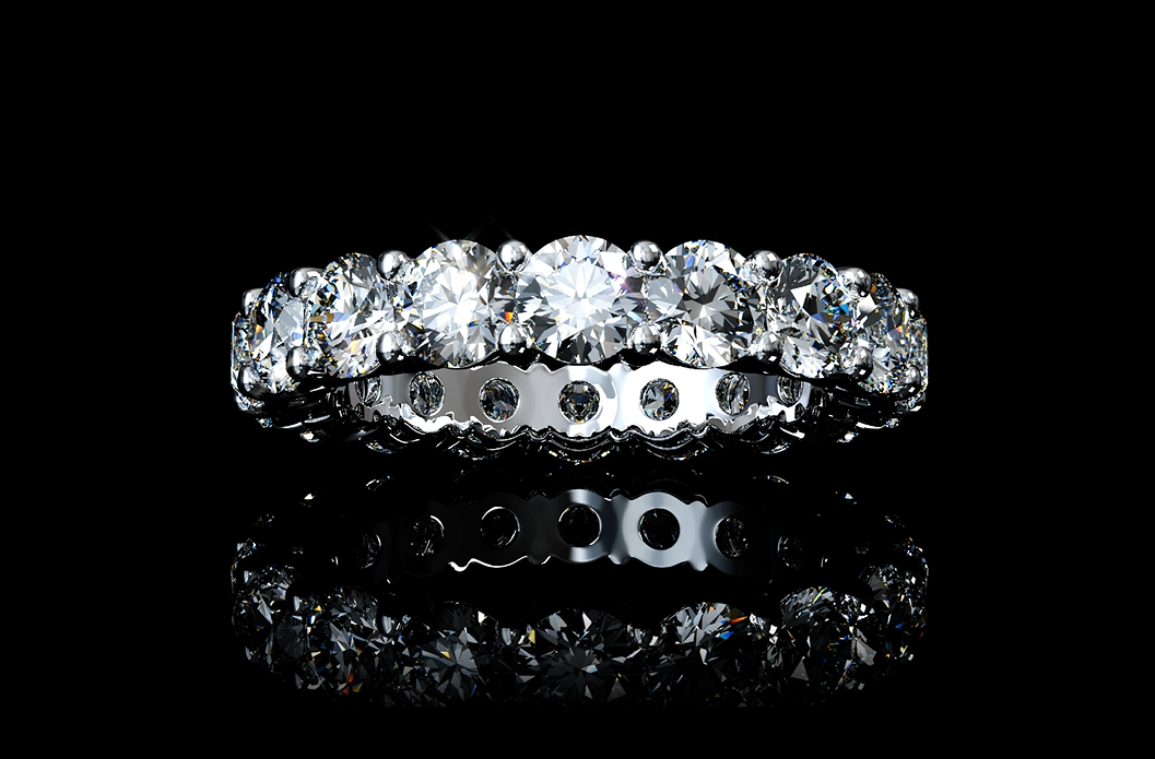A diamond eternity band on black