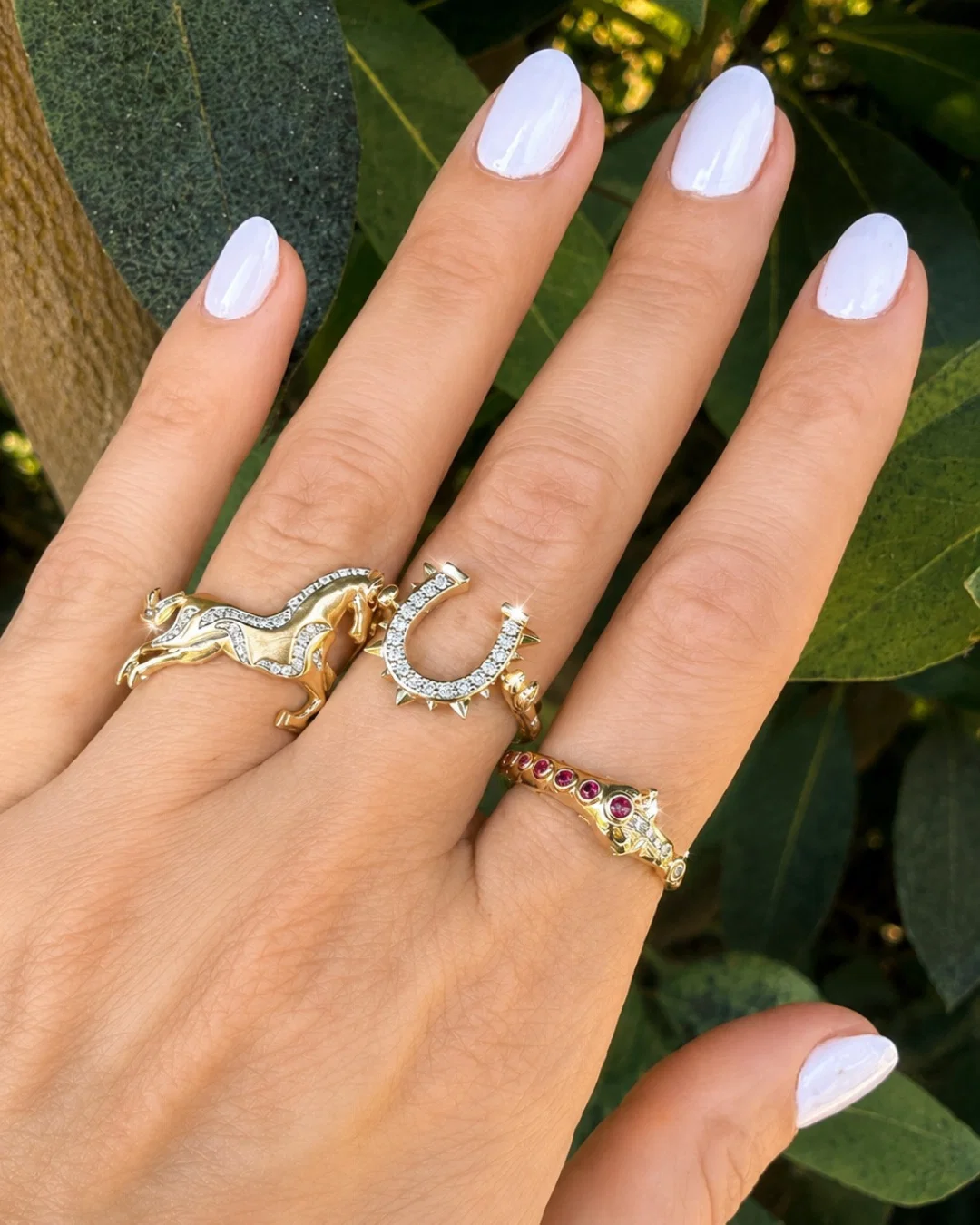 Three Stories gold statement rings and stacking bands