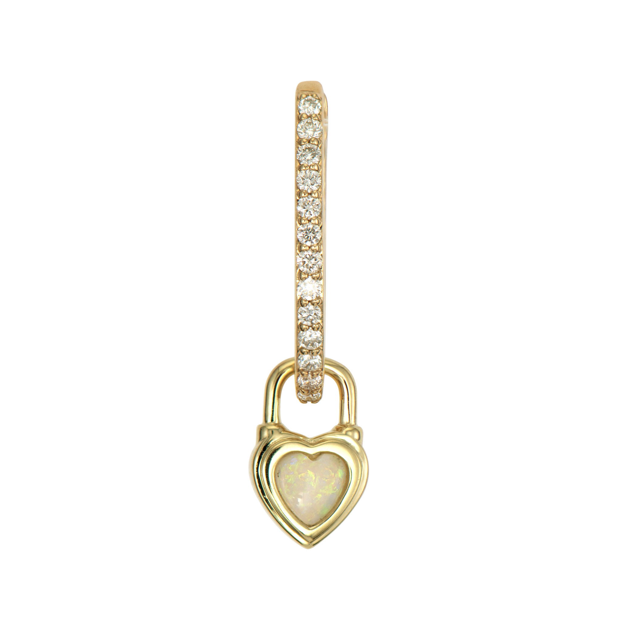 Vibrant heart shaped white opal bezel set in 14K yellow gold make the Single Beating Heart White Opal Charm sparkle. This tiny charm looks amazing on a Three Stories hoop earring or added to a detachable bale and hung on a Three Stories chain necklace or bracelet.Charms sold as singles. Hoop sold separately. Beating Heart White Opal Charm