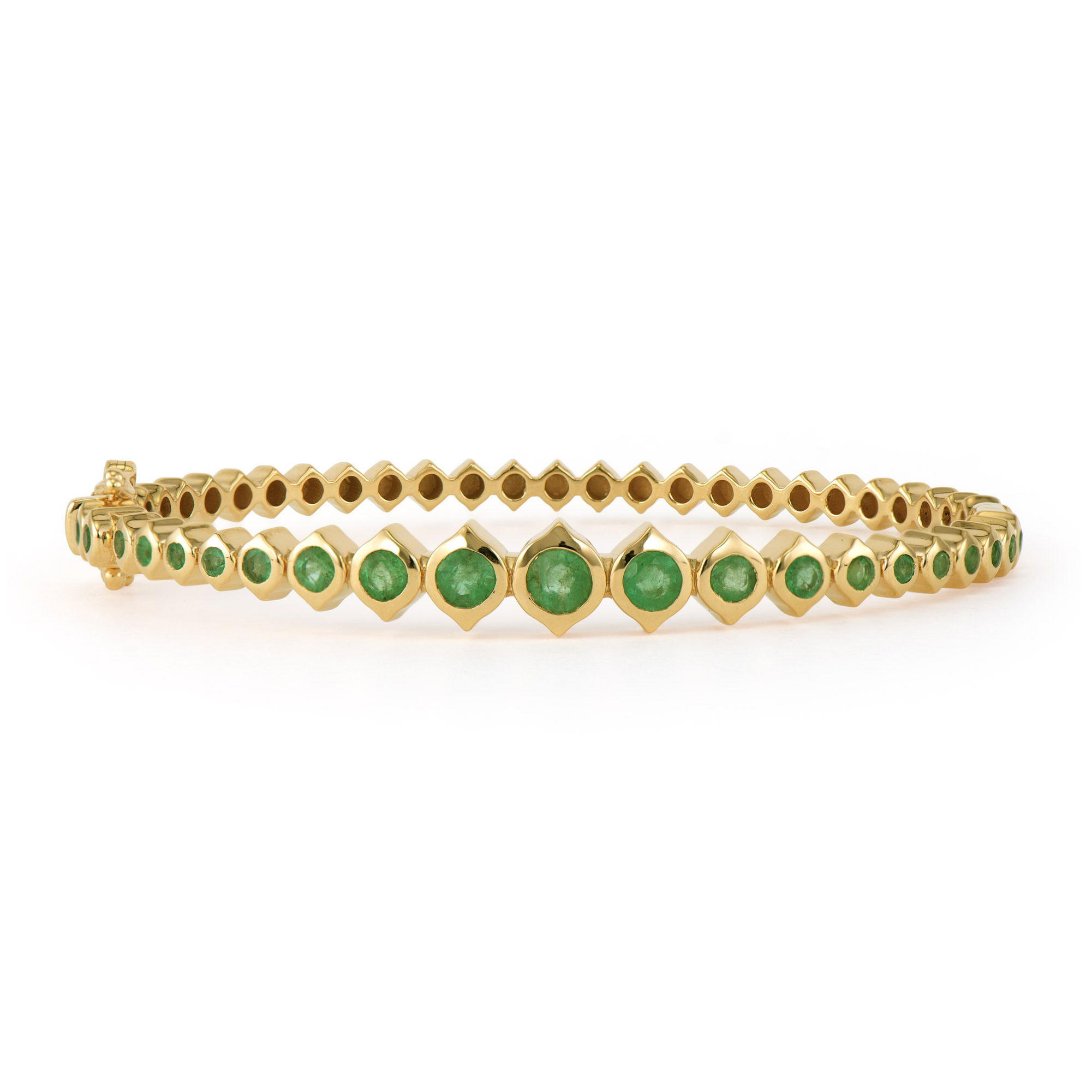 How do you show your love? The Show Your Love Graduated Bezel Set Emerald Bangle features bezel set round emeralds in 14k yellow gold with new double tear drop design motif. This stunning sparkling bangle looks amazing alone or in a Three Stories bracelet stack. Show Your Love Graduated Bezel Set Emeralds Bangle