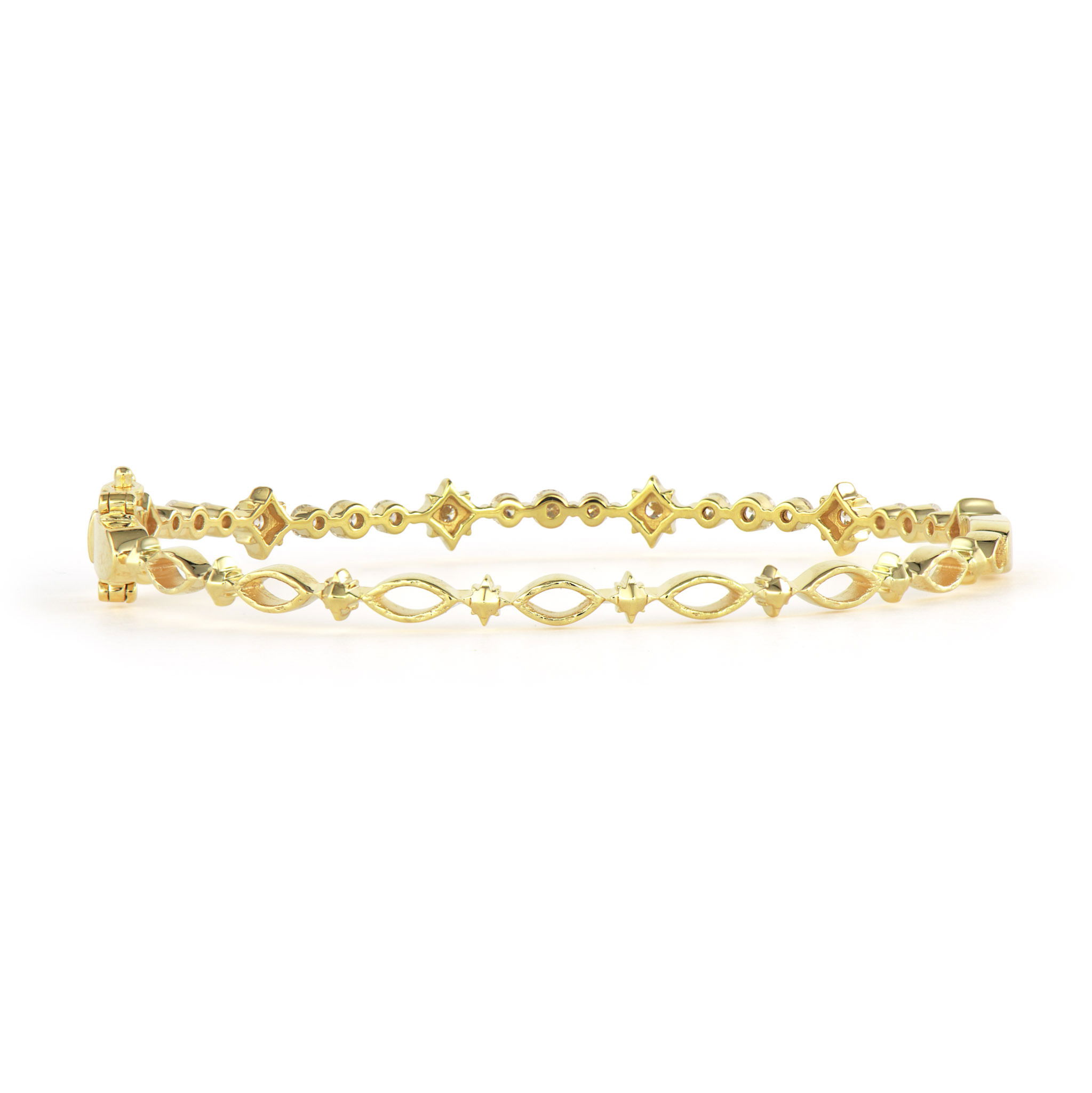 The Narrow Diamond Star Bangle brings celestial elegance to your wrist in a delicate design. Crafted in 14K gold, this refined bangle features an alternating star pattern adorned with sparkling diamonds across the front. The back showcases beautiful openwork gold detailing that creates visual interest while ensuring comfortable wear.The alternating star motif adds rhythm and movement to this sophisticated piece, while the narrow profile makes it perfect for stacking or wearing alone. The contrast between the diamond-studded stars on the front and the intricate openwork on the back creates a bangle that's as beautiful from every angle as it is meaningful. Whether worn solo or stacked with other Three Stories bangles, this piece adds a touch of stellar sparkle to any look. Narrow Diamond Star Bangle