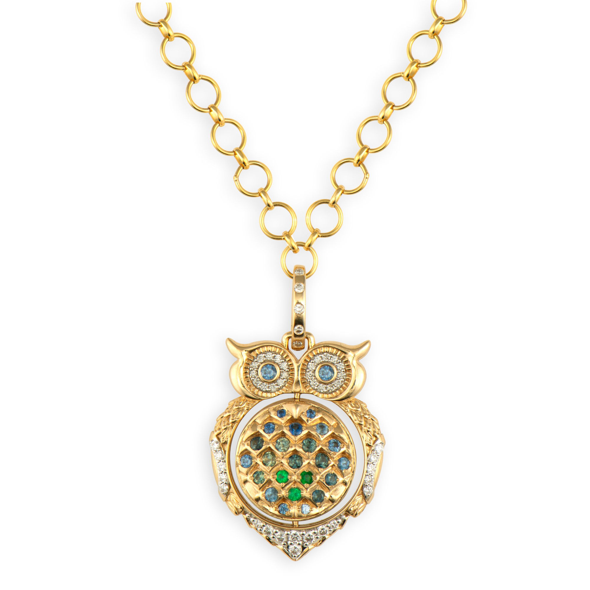 PRE-ORDER 8-10 WEEK DELIVERY TIMEThis enchanting 14k yellow gold owl locket features two distinct sides: one adorned with brilliant diamonds, the other showcasing multi-colored sapphires and emeralds. The owl's belly moves to reveal dual treasures—a luminous opal on one side and a secret locket on the other that opens to unveil a tree of life with "Wisdom" inscribed within.This award-winning design blends artistry with meaning, creating the perfect piece for those who appreciate fine craftsmanship and meaningful jewelry. Carry your story close to your heart with this stunning statement piece that celebrates wisdom and wonder.Winner of the Couture Design Award in the "Under $10K Retail" category. Wise Owl Double Sided Locket Pendant
