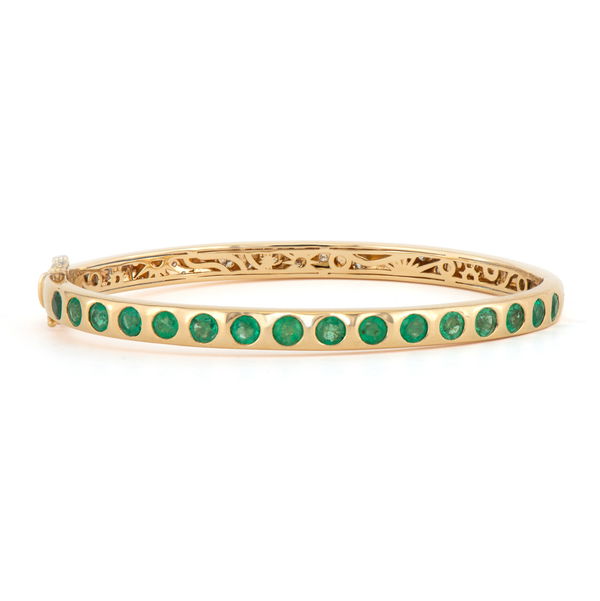 Closeup photo of Day and Night Engraved Diamond Bangle with Emerald