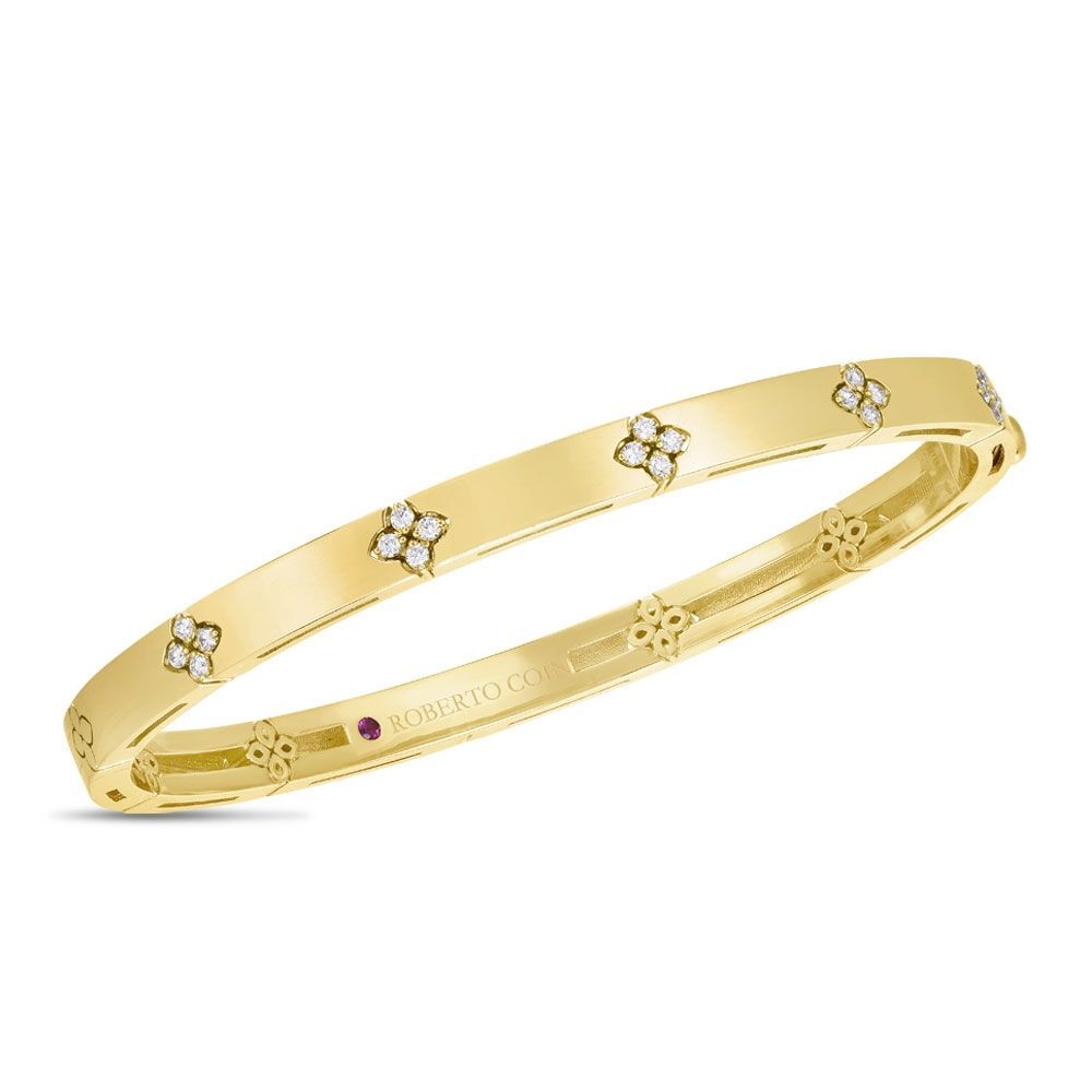 Roberto Coin combines his technological prowess with time-honored craftsmanship to create the new Verona collection. The four-petaled floral motif repeats in diamonds and in engraving, even reappearing in the gallery of each piece as a reminder of our inner beauty. 18K YG Love in Verona Bangle with Diamonds