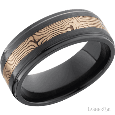 Black Zirconium 8mm flat band with grooved edges (satin finish), and polished mokume inlay.(If your size is not currently available we will order your Lashbrook ring, shipping will take approximately 4 - 6 weeks.) Feel free to email or call us for a specific size or customization. Black Zirconium Flat Band with Mokume Inlay