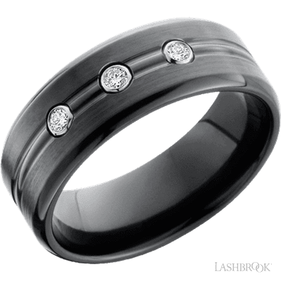 Zirconium 8mm beveled band with three diamonds, bezel setting around the diamonds. Satin and polished finish.Diamond CTW - 0.05 (If your size is not currently available we will order your Lashbrook ring, shipping will take approximately 4 - 6 weeks.) Feel free to email or call us for a specific size or customization. Zirconium Band with Diamonds Ring