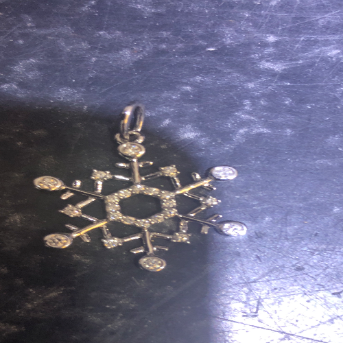 .25ct Diamond - Pendant only, chain not included 14kW Gold .25ct Diamond Snowflake Pendant