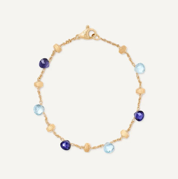 Closeup photo of 18K Yellow Gold Single-Strand Topaz and Iolite Bracelet