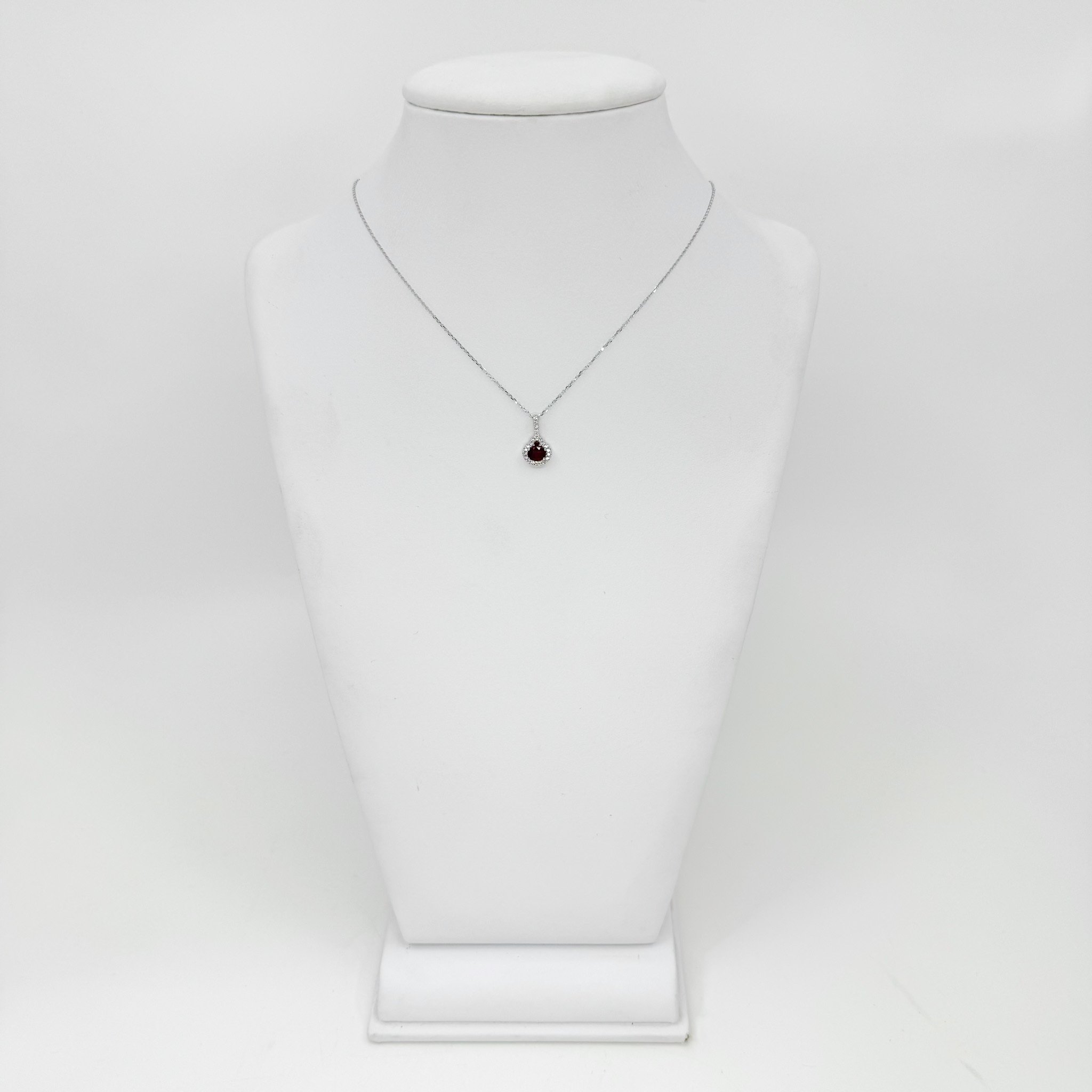 Ruby and Diamond pendant set in 14kw, Ruby 0.55ct, Diamond 0.10ct.
