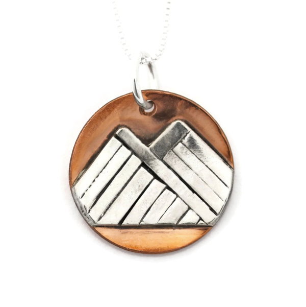 Closeup photo of Handmade Summer Mountain Circle Copper and Sterling Silver Pendant