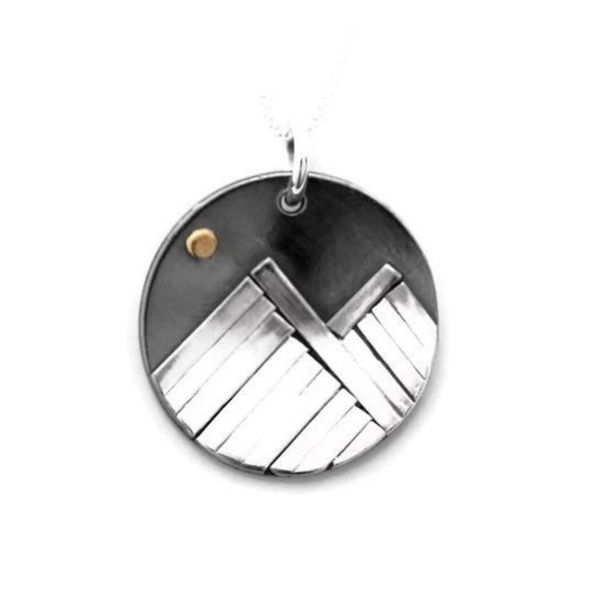 Closeup photo of Handmade Bright Moon Mountain Mini Summer 1/2” 22K and Sterling Silver Pendant